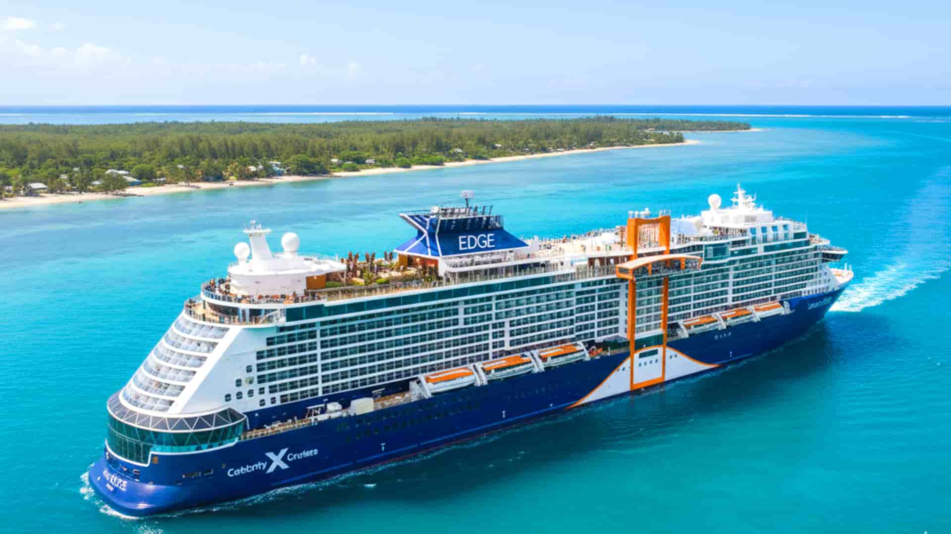 Celebrity Edge cruise ship sailing along the coastline during a tropical cruise.