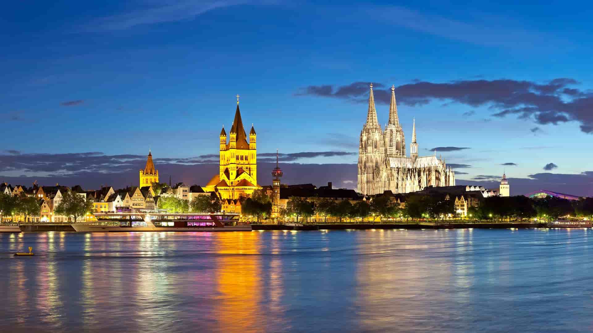 Cologne Cathedral and city at night.