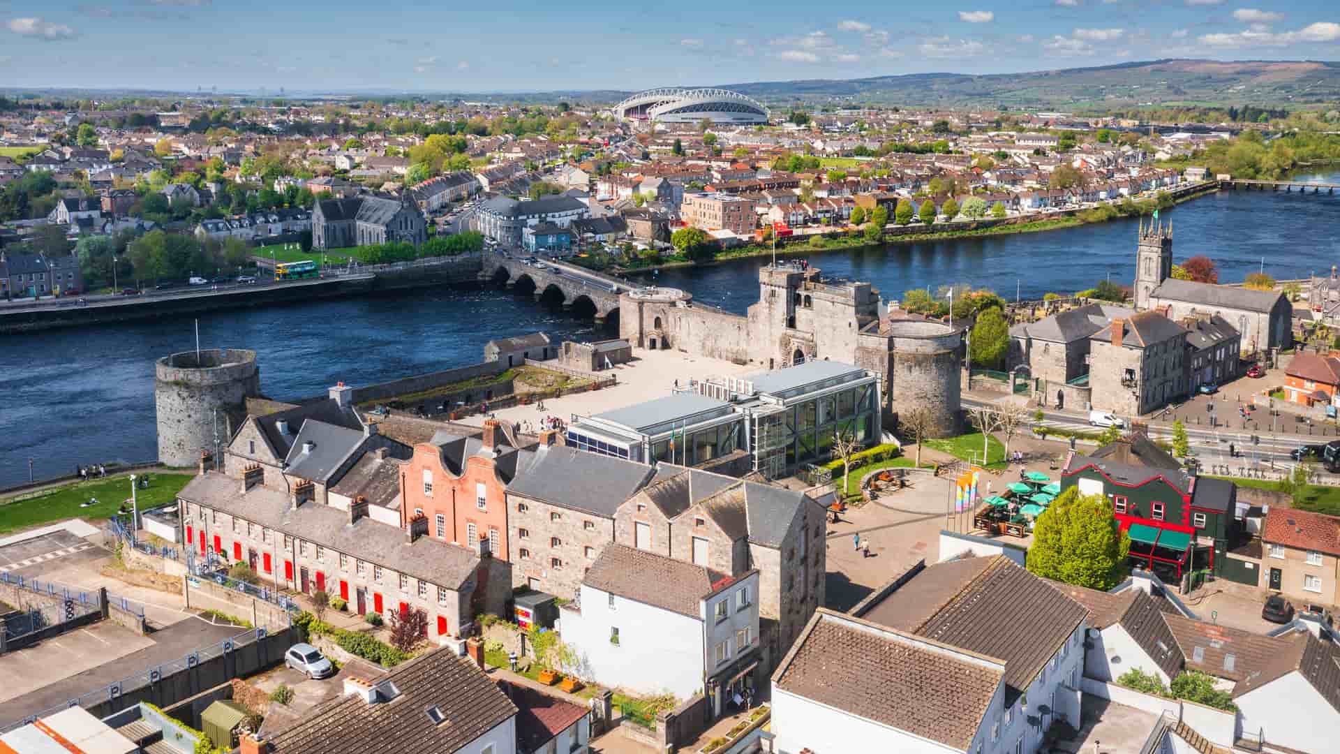 "An aerial view of the historic King John's Castle in Limerick, Ireland, a major landmark on the banks of the River Shannon.  "