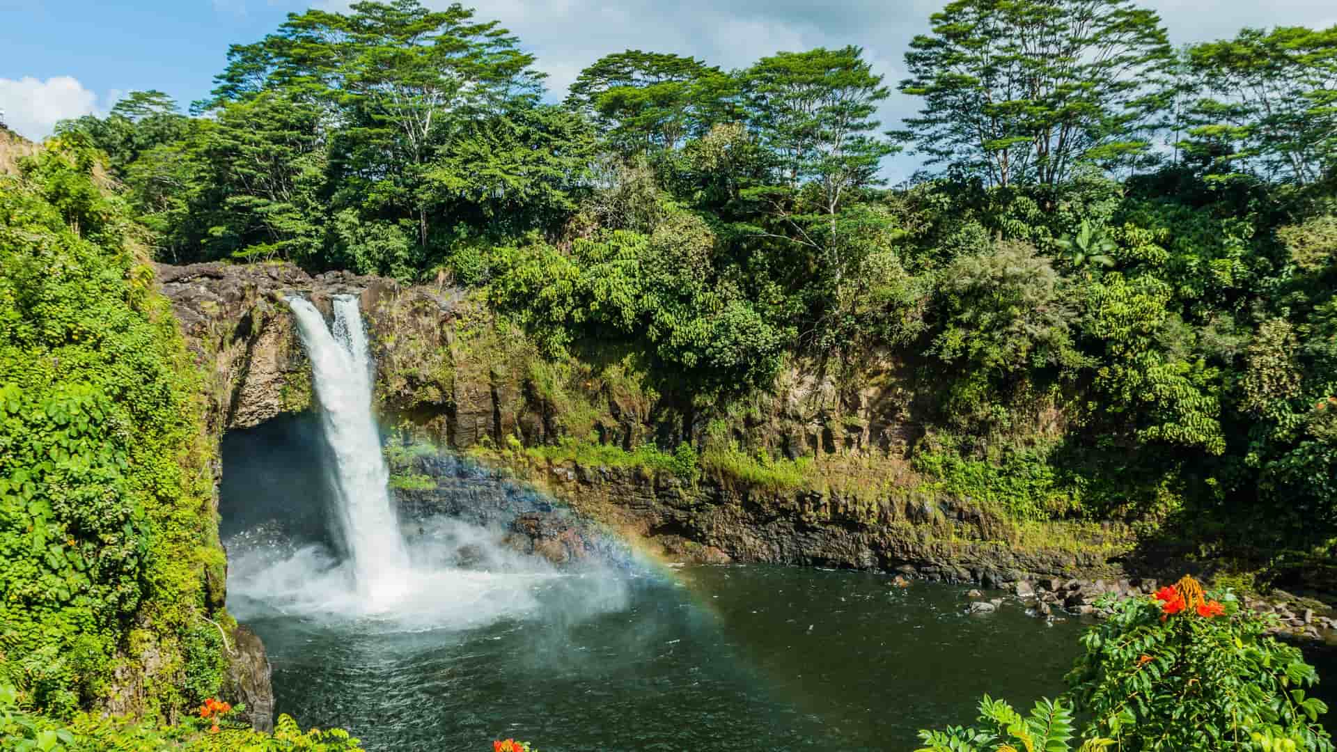 Waterfall and rainbow in Hilo, Hawaii.