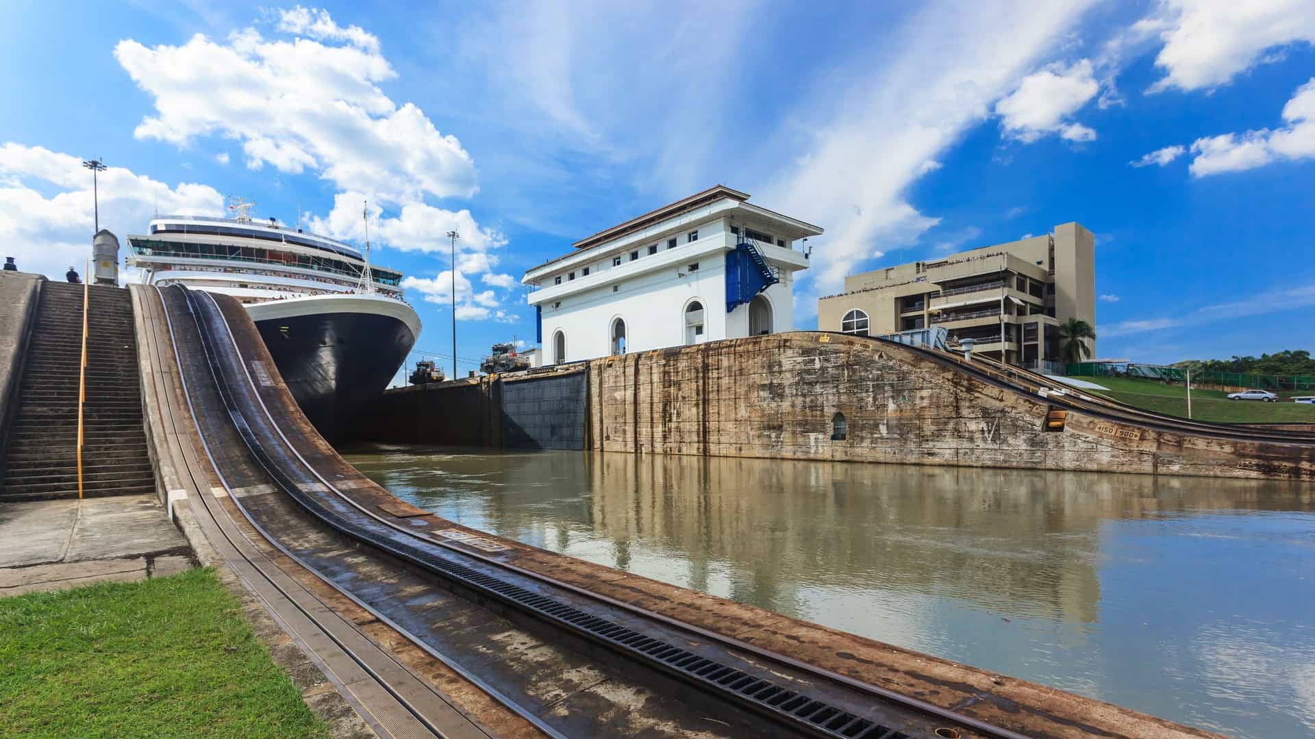 Low angle point of view of a ship sailing through the Panama Canal.