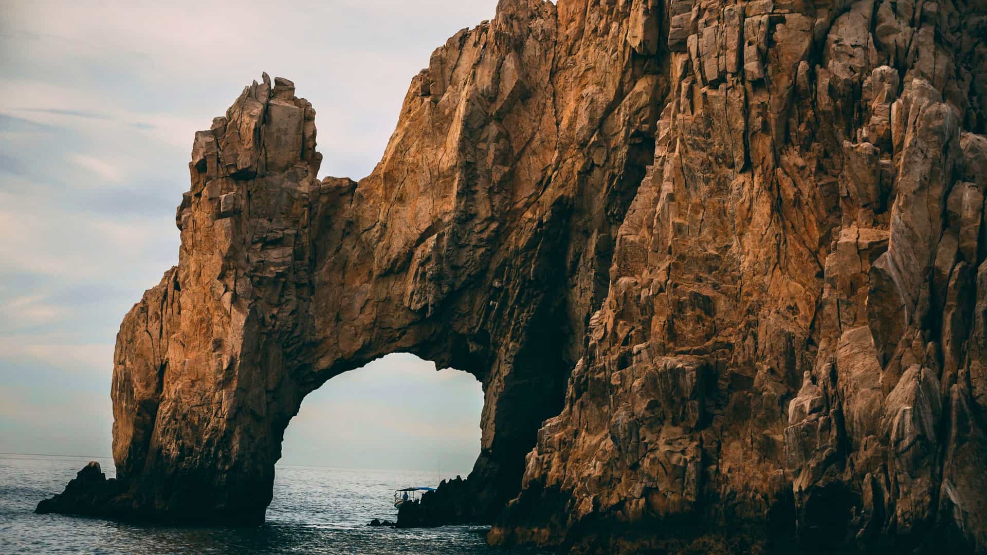 Azamara Cruises: Iconic El Arco rock formation at Land's End in Cabo San Lucas, Mexico, viewed from the ocean.