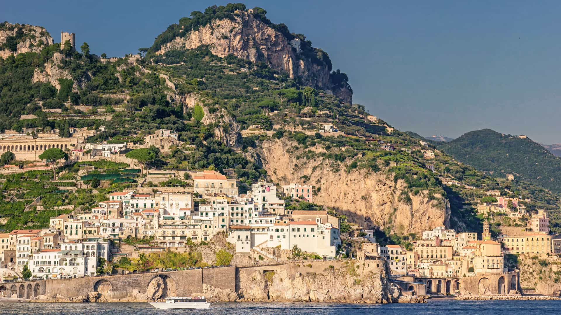Colorful cliffside towns along Italy’s Amalfi Coast overlooking the Mediterranean Sea on a Celebrity Cruises European itinerary.