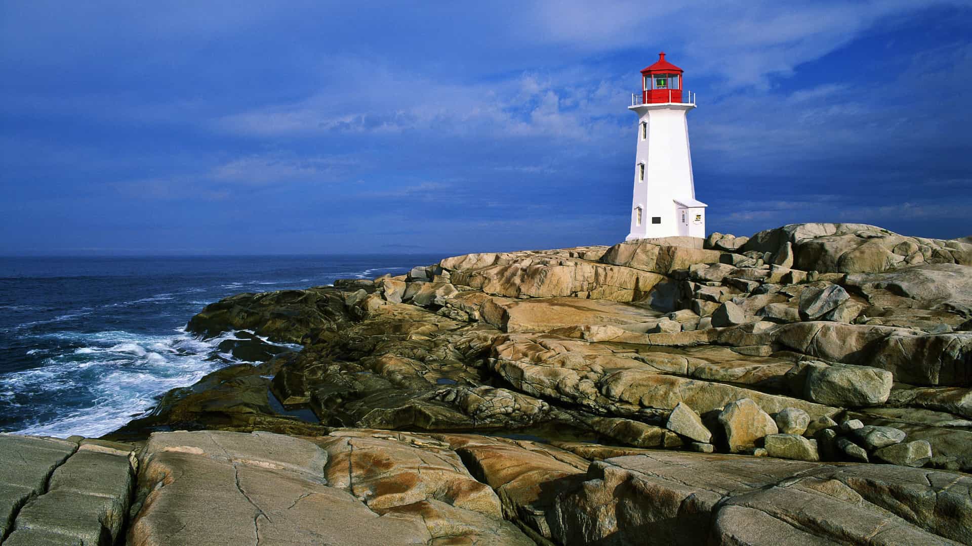 Peggy's Cove Lighthouse, Nova Scotia, symbolizing Celebrity Cruises' Canada & New England voyages.