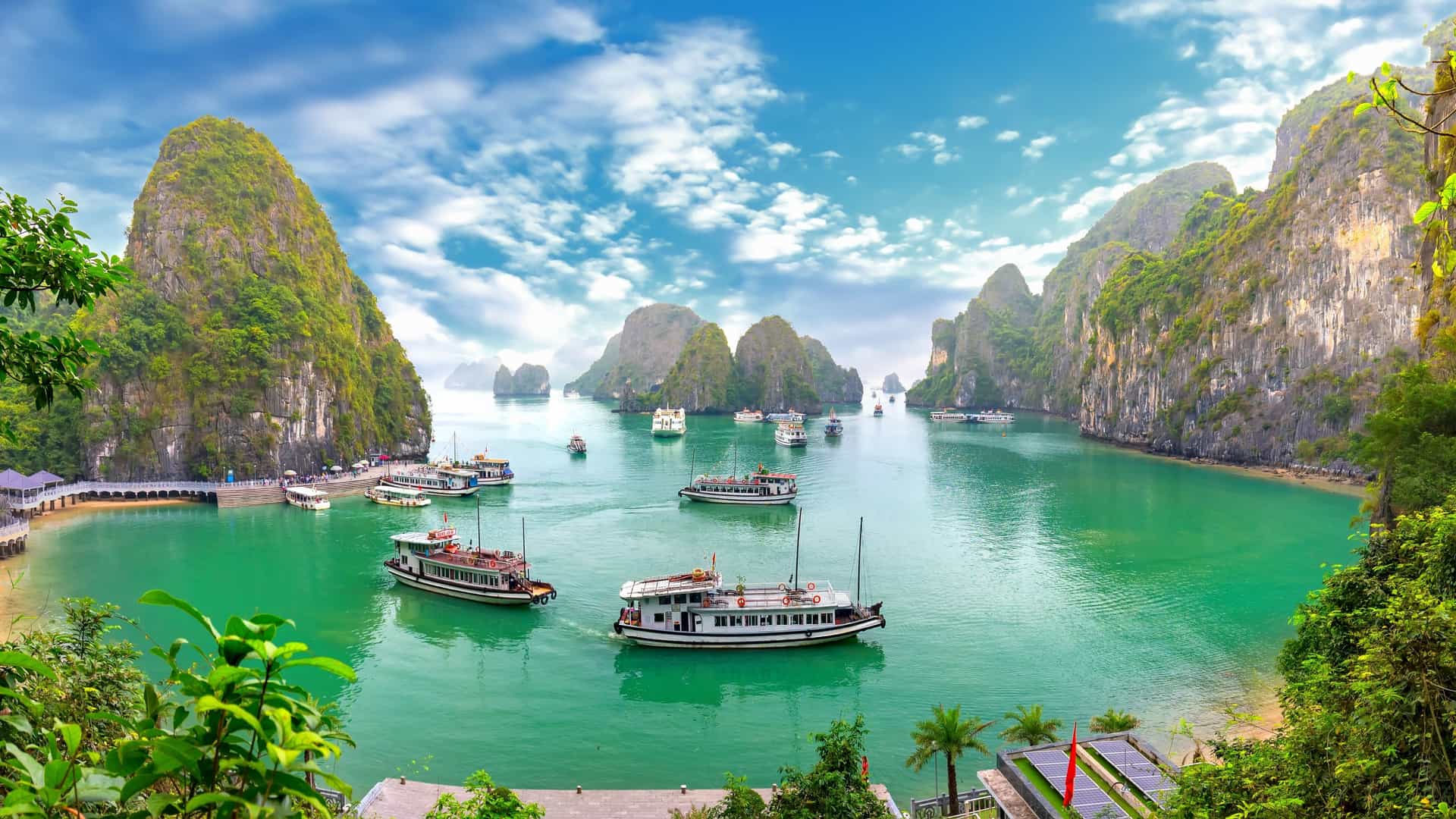  This image is an aerial view of Ha Long Bay, Vietnam, taken from above Bo Hon Island. The photo captures the beautiful natural wonder and UNESCO World Heritage Site.