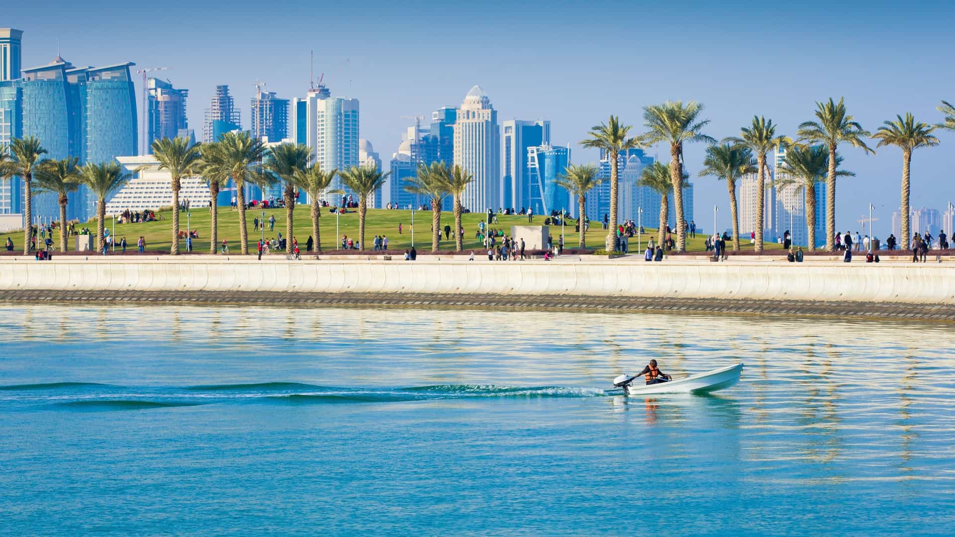 Modern skyline and dhow boats in Doha, Qatar.
