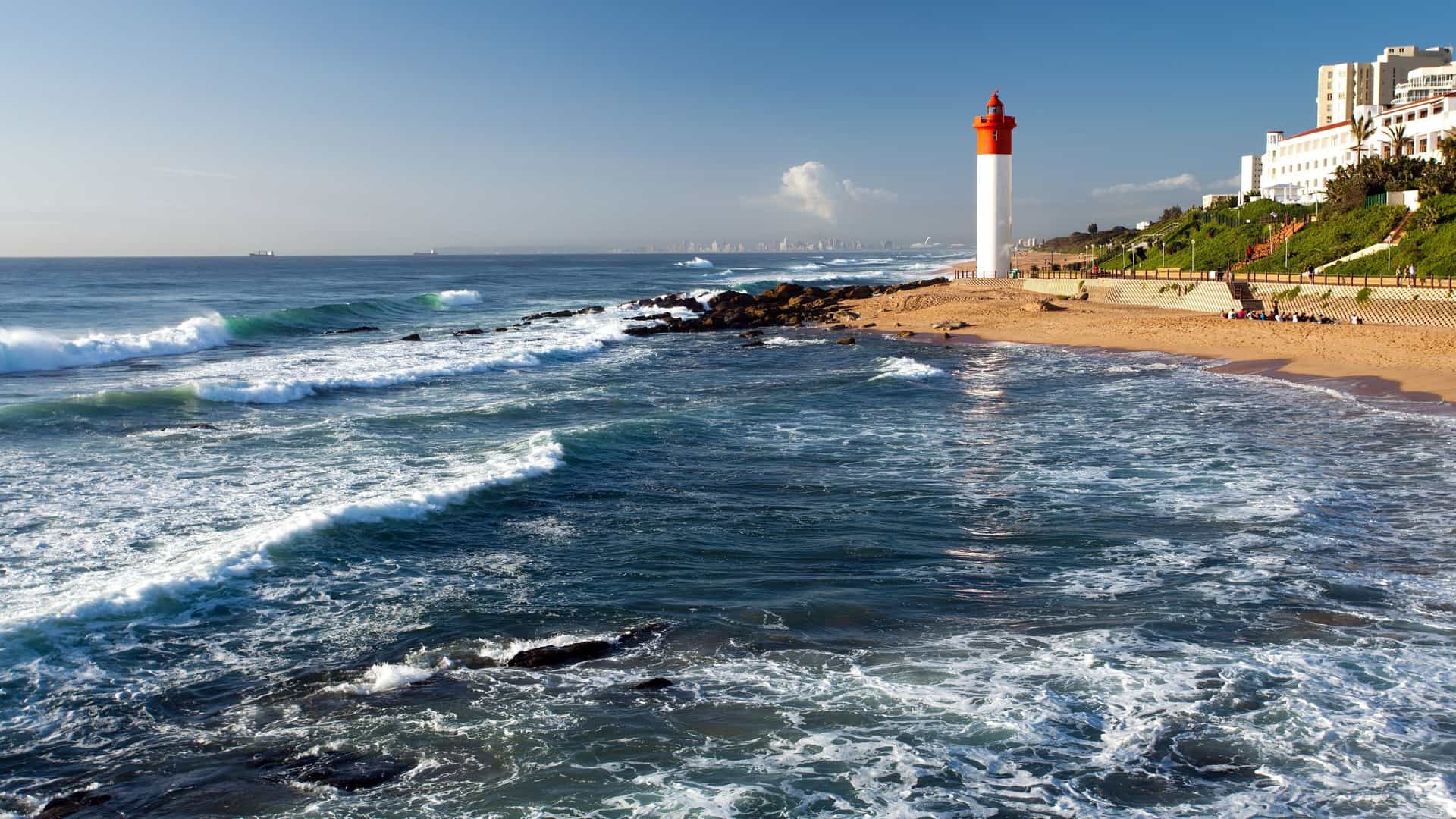Beachfront promenade and palm trees in Durban.