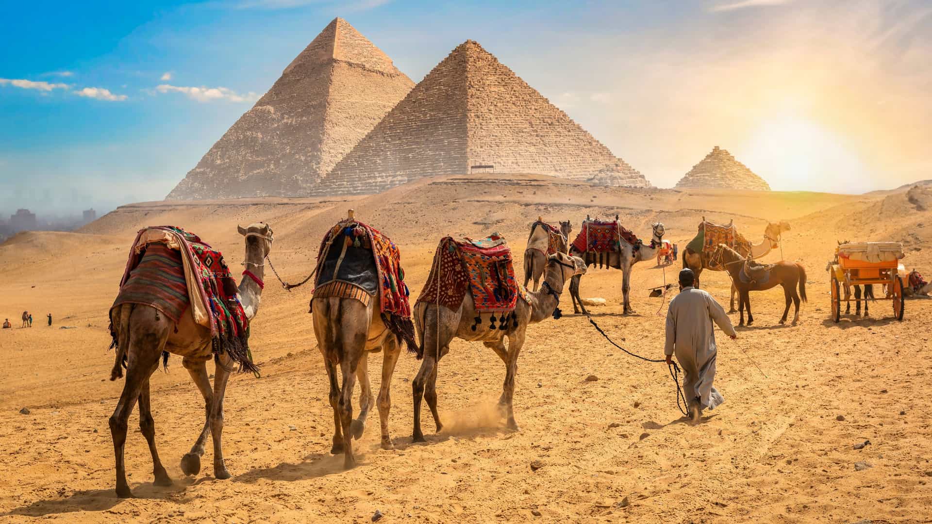 Explora journey view of a traditional sailing felucca on the Nile River at sunset in Egypt.
