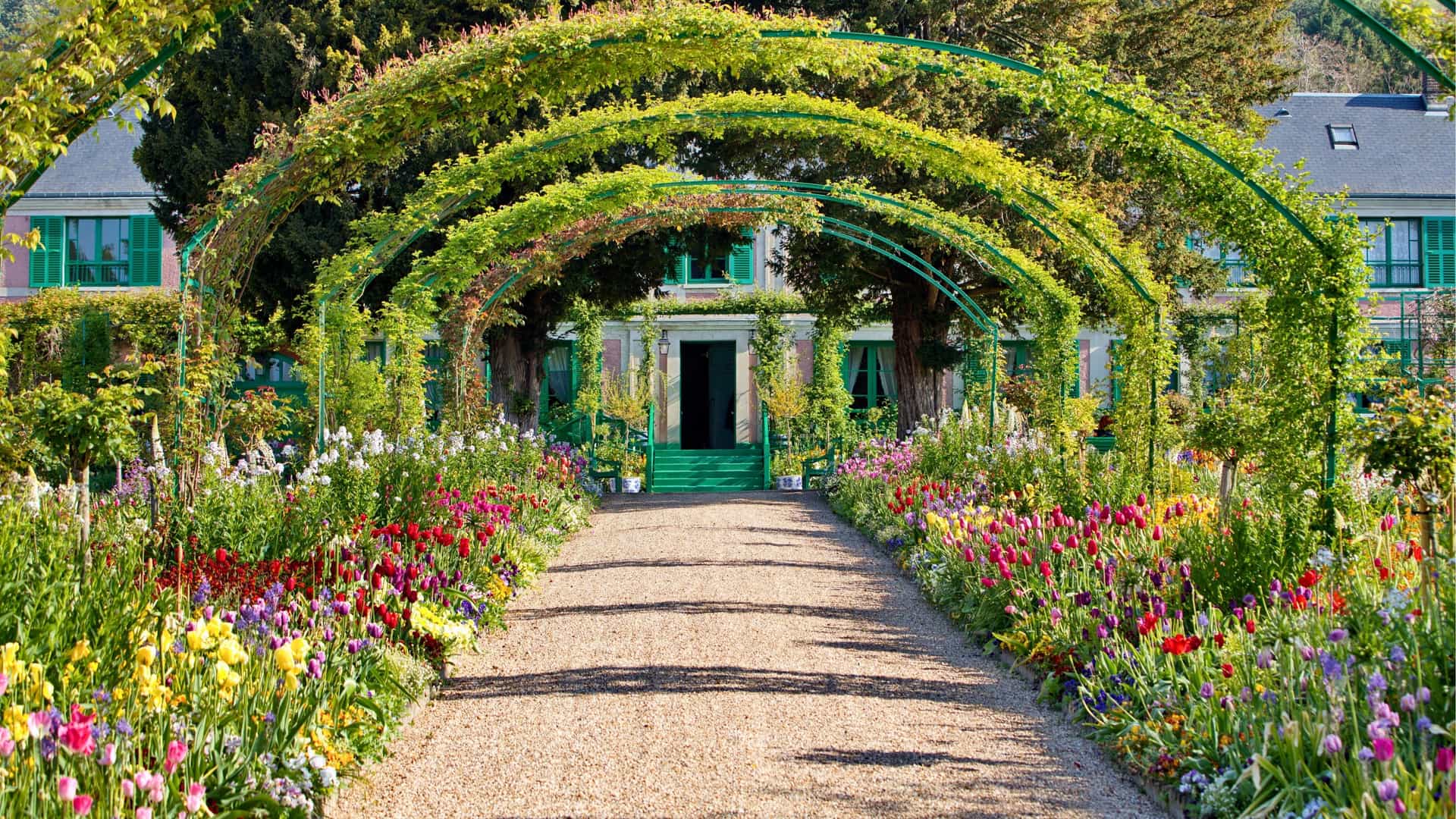 Terrace-covered walk way leading to Claude Monet's house.