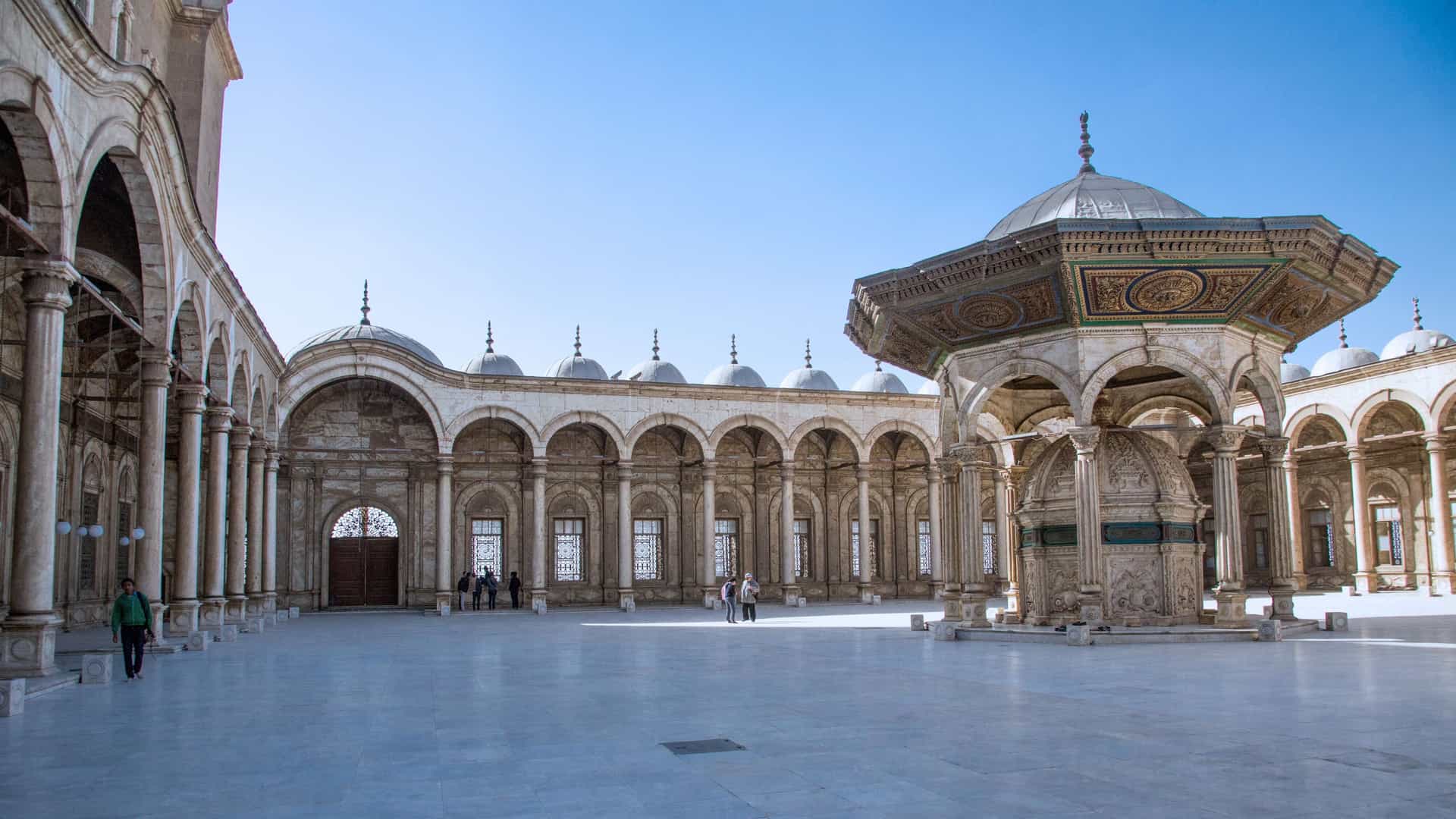 Historic courtyard with arches and domes in Alexandria, Egypt, Northern Africa, featuring ornate architecture and a central pavilion.