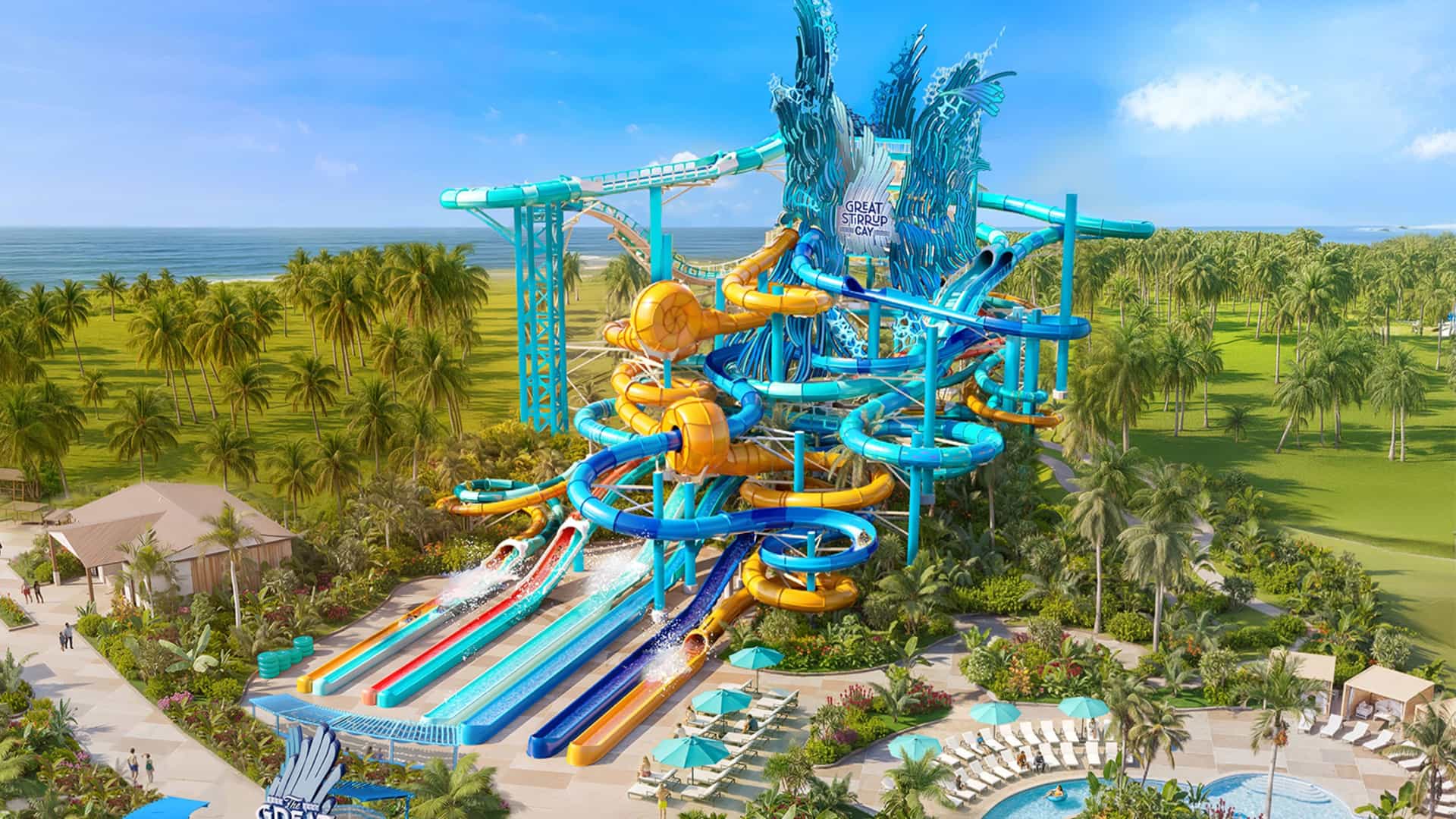 Aerial view of the massive, multi-story water slide complex at Great Stirrup Cay's Great Tides Waterpark, featuring twisting blue and orange tubes, multi-lane racing slides, and a large decorative wave structure at the top.