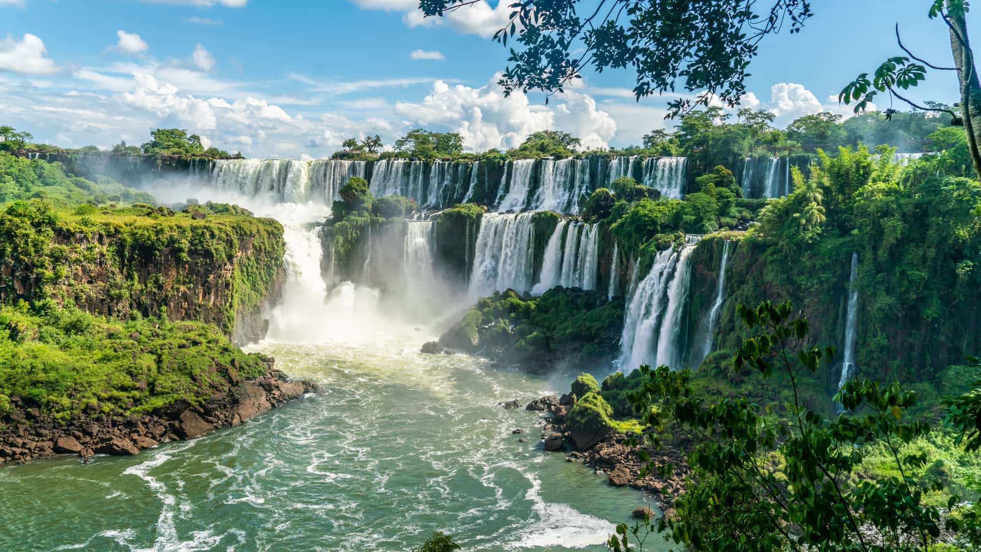 Iguazu Falls on the border of Argentina and Brazil, a breathtaking natural wonder often visited as a pre or post-cruise extension on Norwegian Cruise Line South America itineraries.