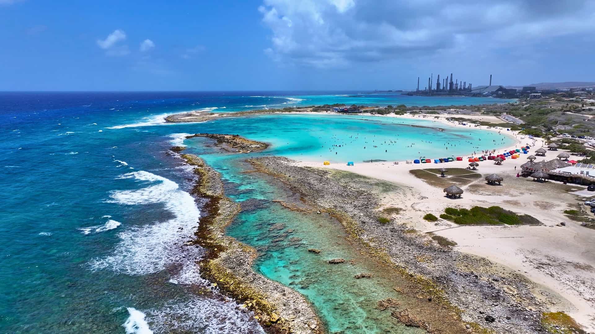 The tranquil turquoise waters of Baby Beach in Aruba, a picturesque shore excursion on a Royal Caribbean Southern Caribbean cruise.