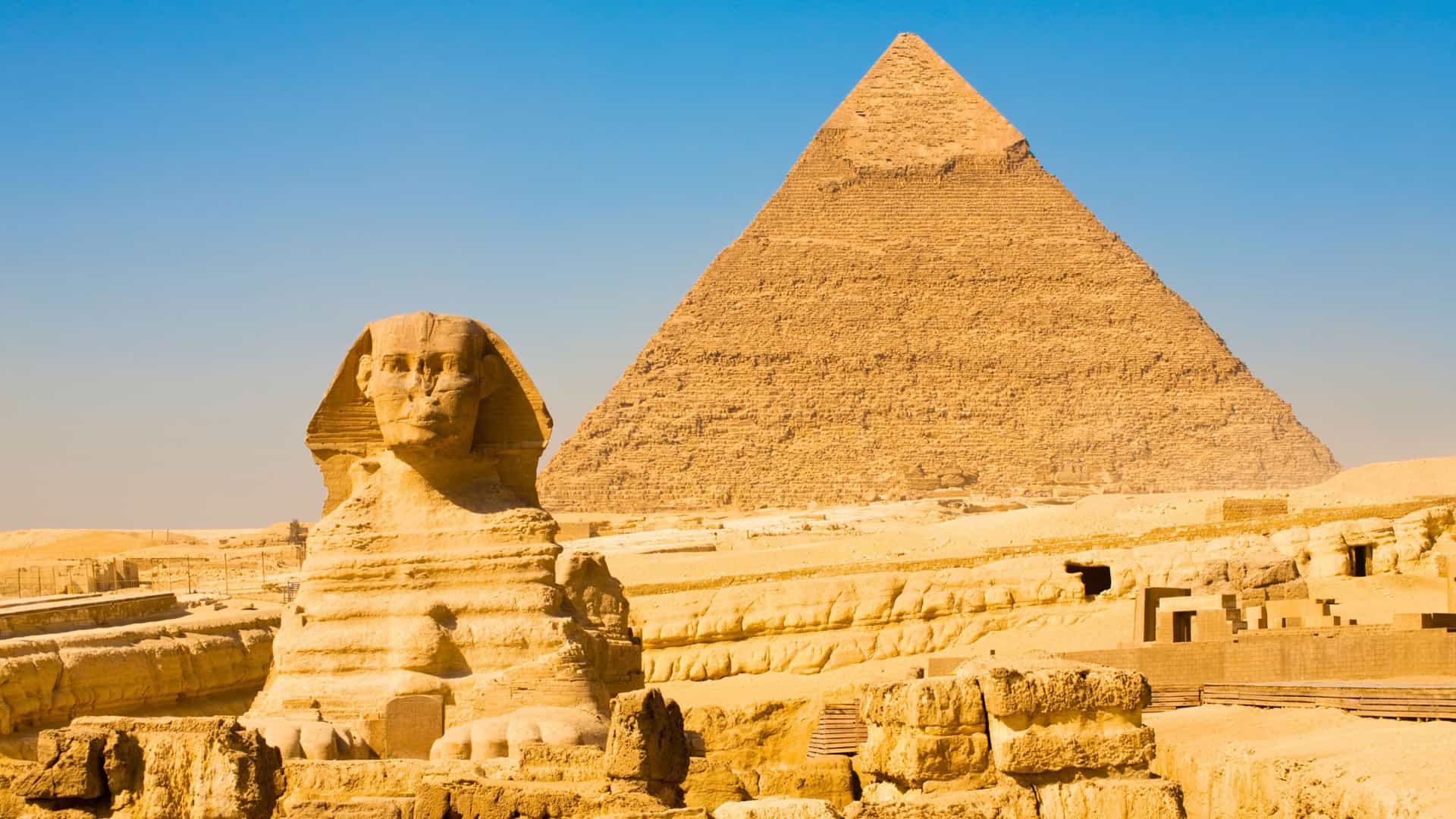 The Great Sphinx and a pyramid in Giza, Egypt, Africa, a potential shore excursion destination during a luxury Seabourn cruise in Africa.