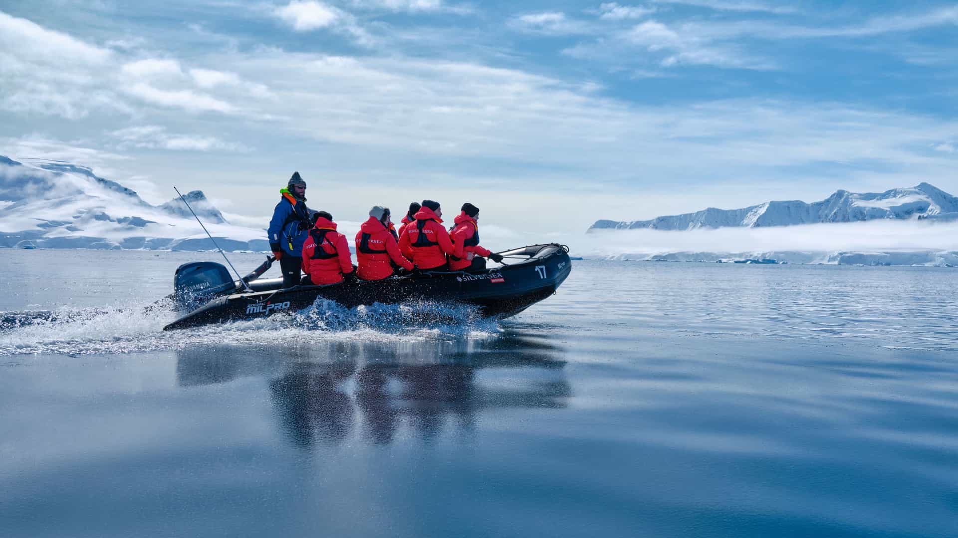 A group of people enjoying a zodiac tour on a Silversea cruise.