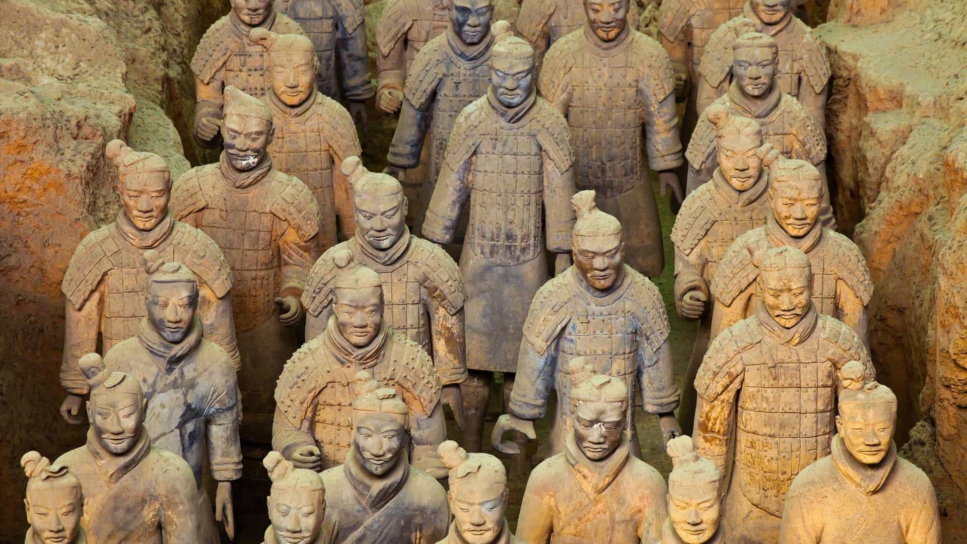 A close-up view of the Terracotta Army, an ancient collection of life-sized warrior sculptures in Xian, China, representing a significant historical and cultural site in Asia visited on a Uniworld river cruise.
