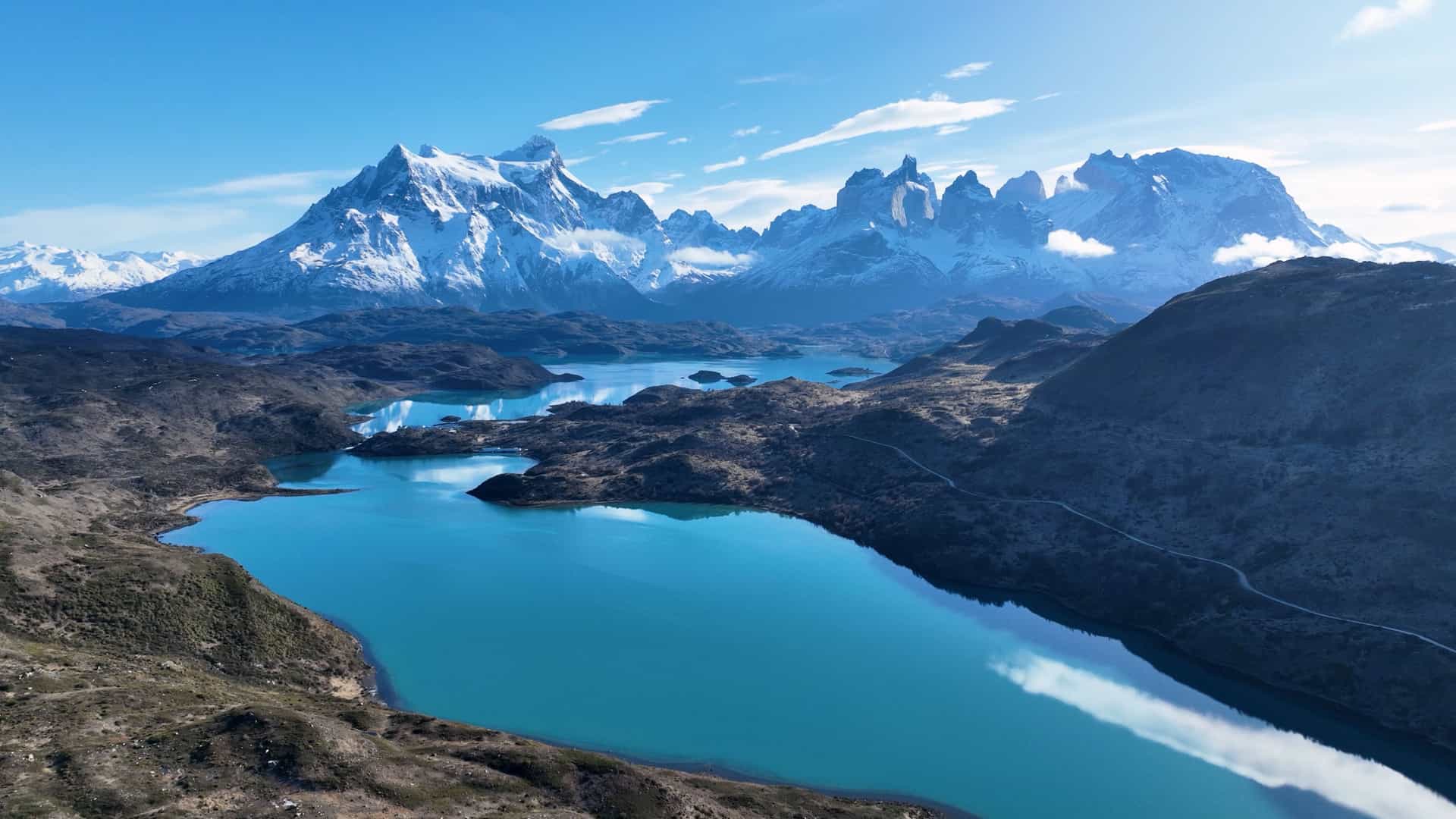 Snow-capped peaks and turquoise lakes near Punta Arenas, Chile—an unforgettable destination on Viking Expedition Cruises through South America's Patagonia region.