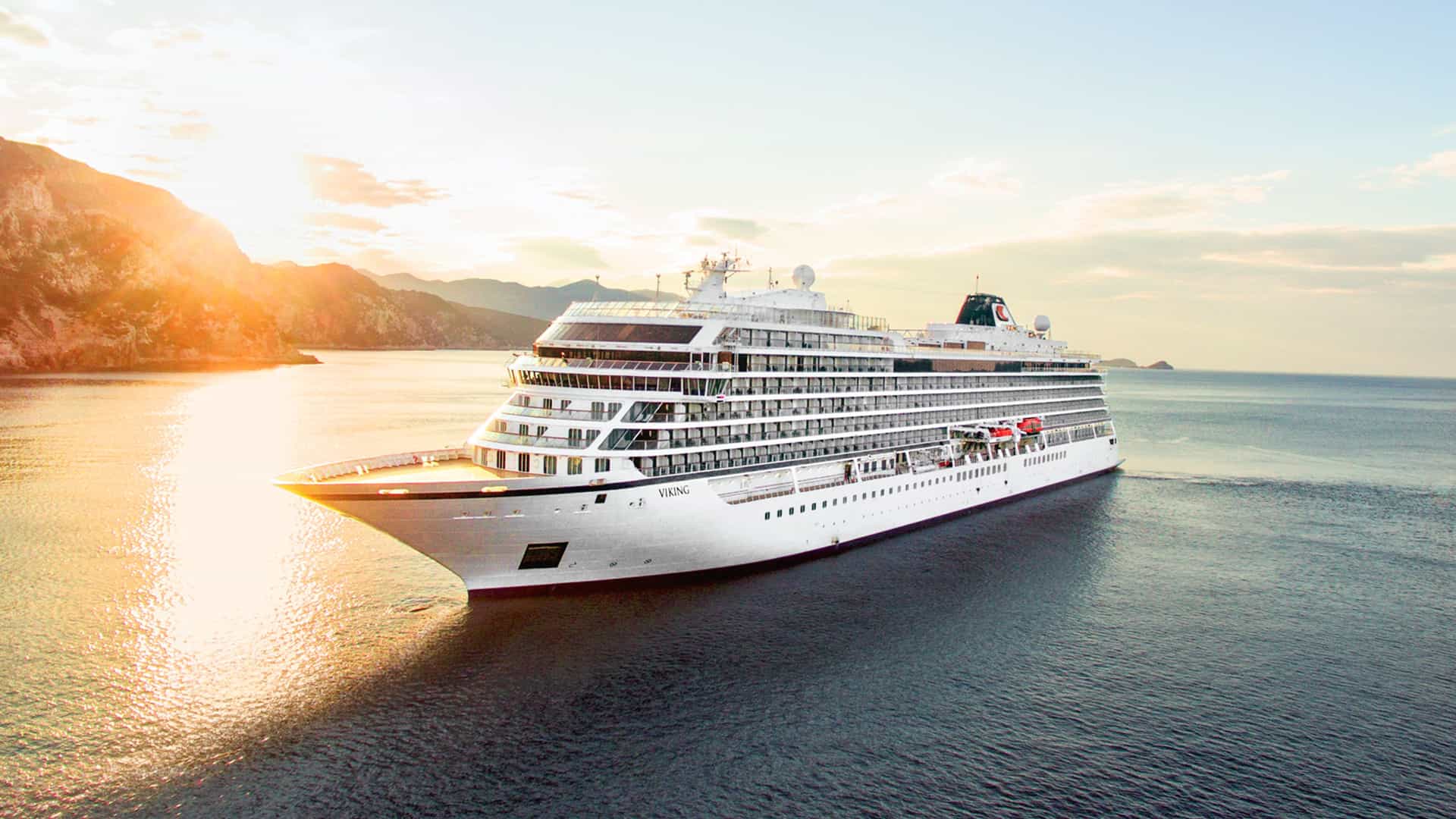 Viking Mars sailing at sunset.