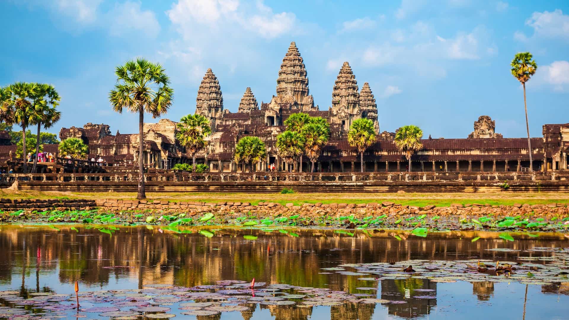 Angkor Wat temple complex in Siem Reap, Cambodia, reflected in a tranquil pond—an iconic cultural stop on Viking River Cruises' Southeast Asia itinerary.