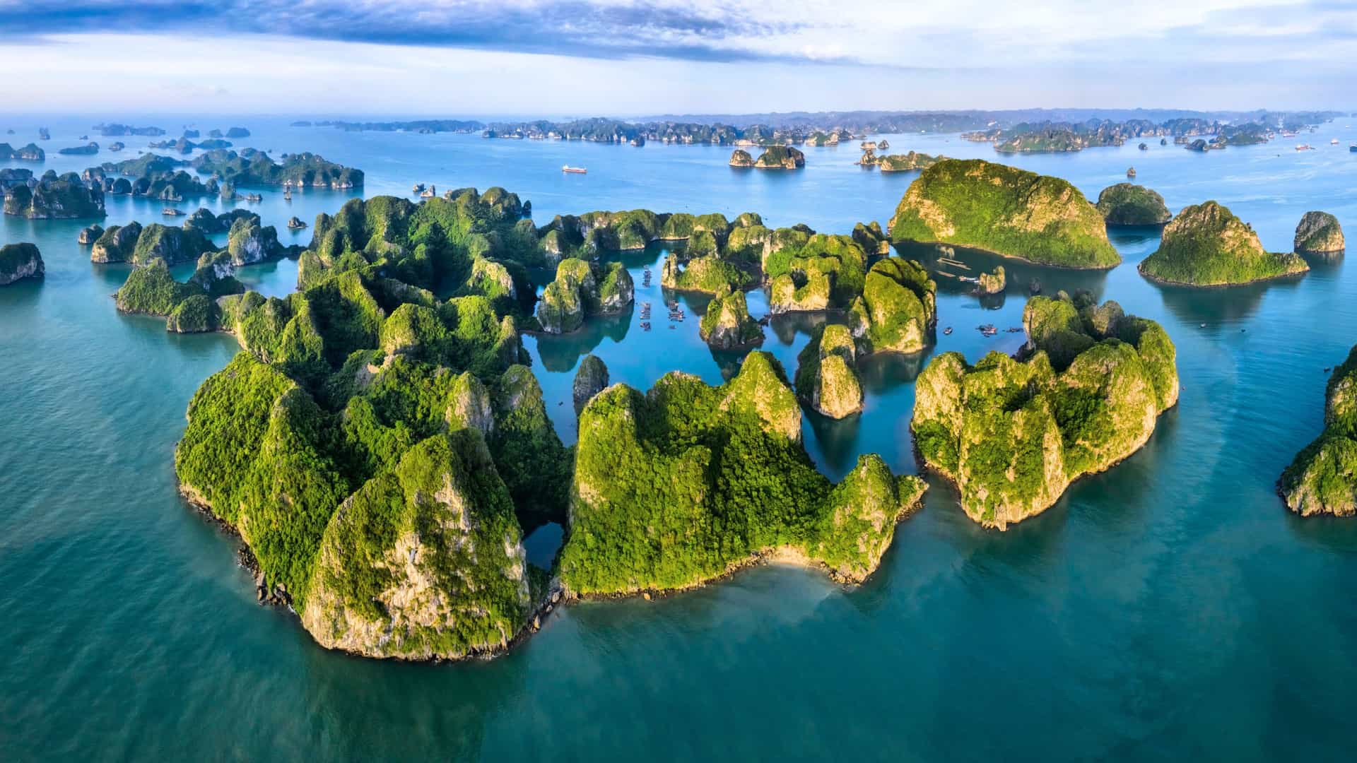 An aerial view of the limestone karsts and islands of Ha Long Bay, Vietnam, a scenic destination on a Windstar cruise in Southeast Asia.