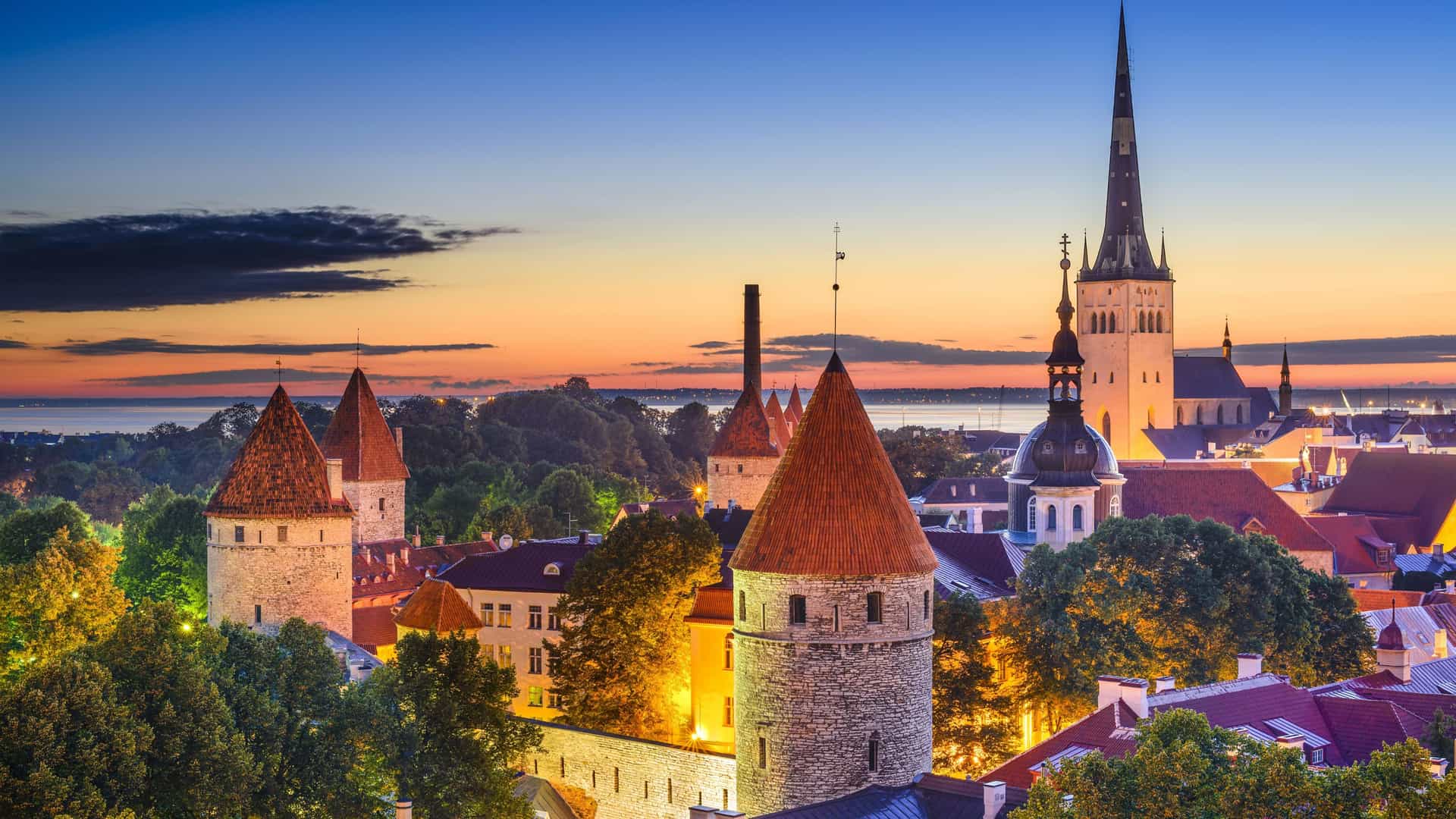 Historic Old Town skyline of Tallinn, Estonia, at dusk, a port of call for a Windstar cruise in Northern Europe.