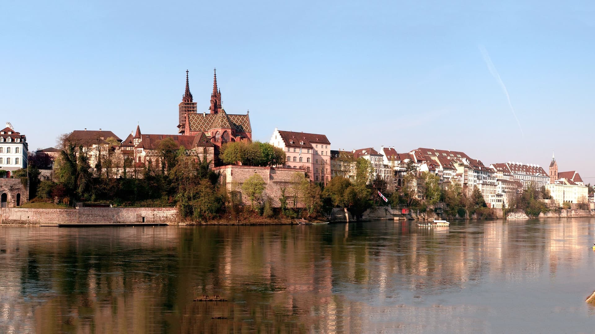 Basel cityscape and Minster along the Rhine.