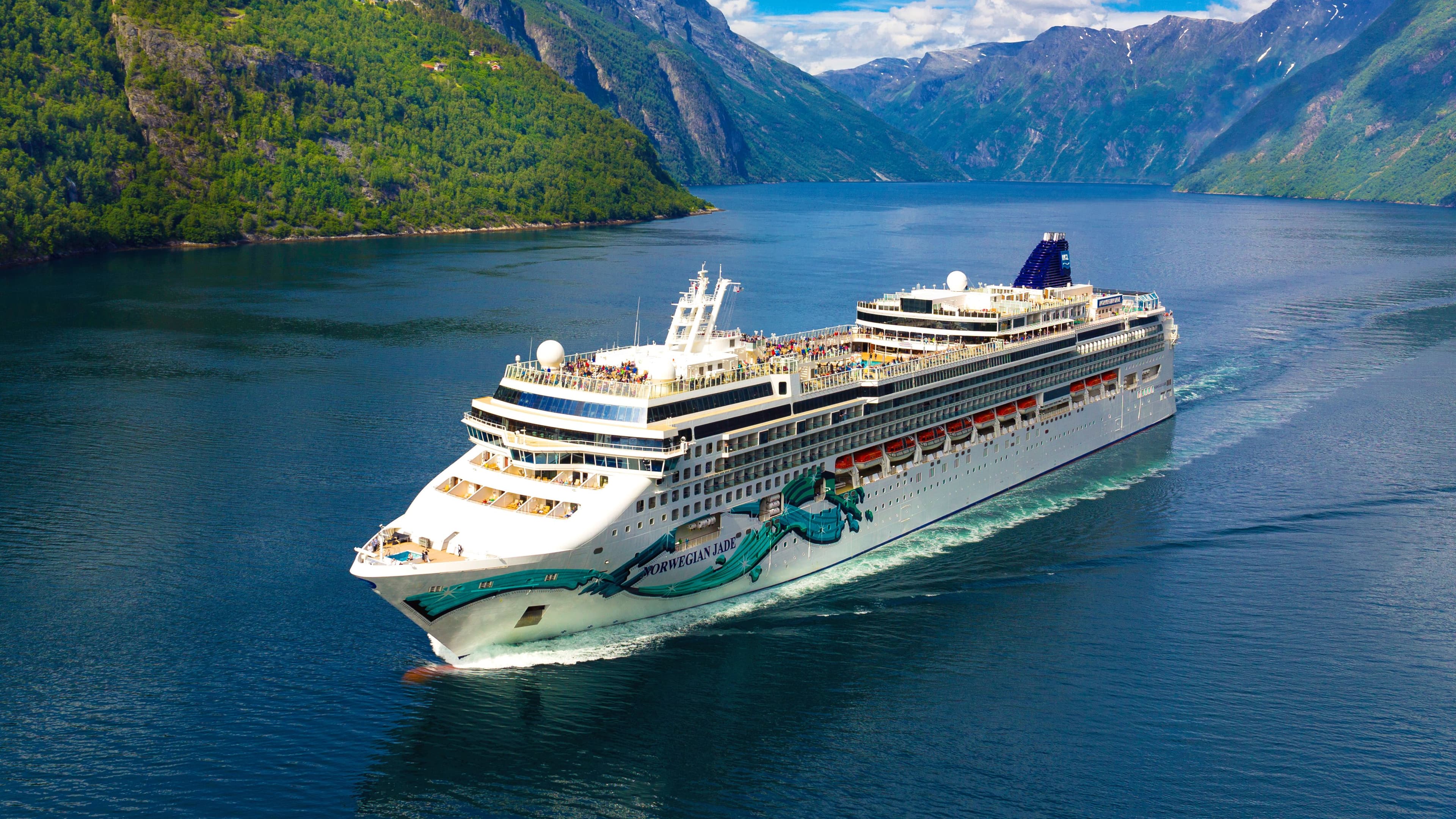 Norwegian Jade sailing in a fjord.