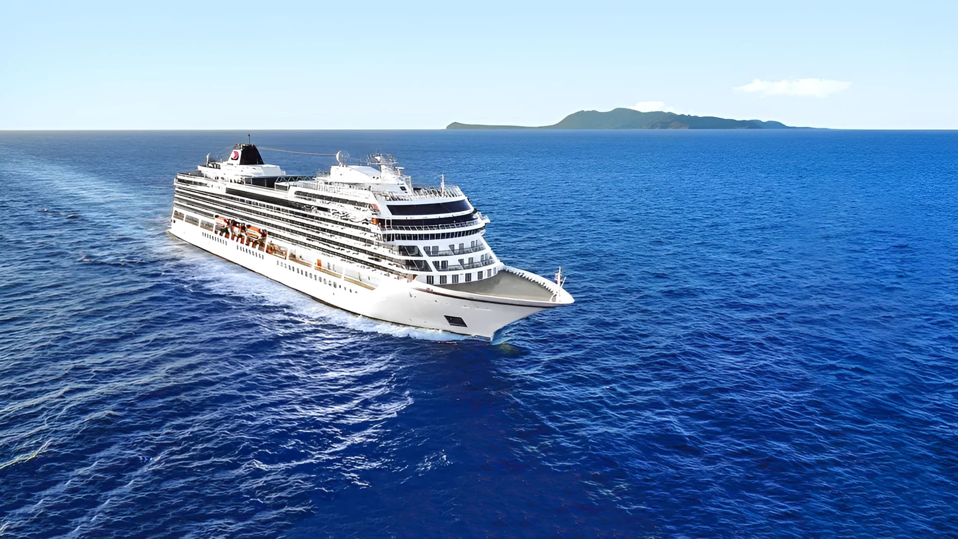 VIking Vesta sailing on vibrant blue seas.