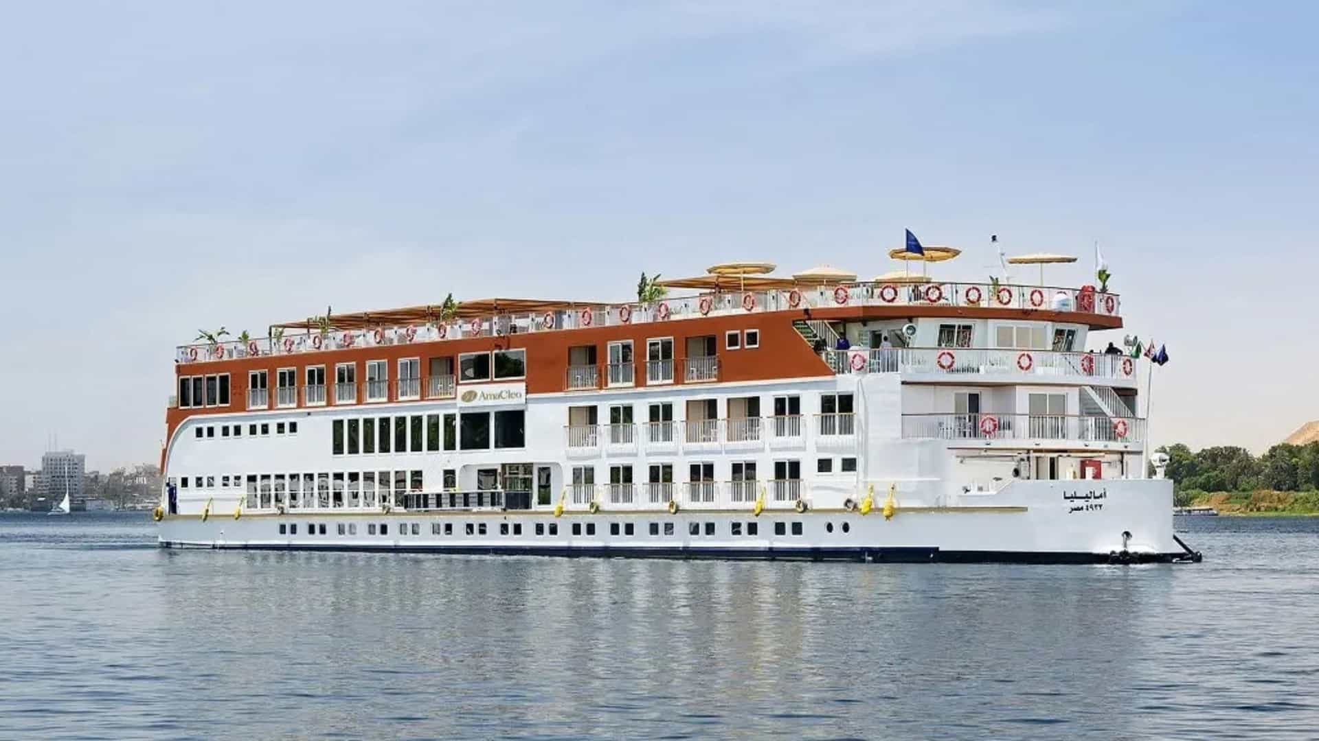 AmaWaterways AmaCleo river cruise ship sailing along the Nile River in Egypt.