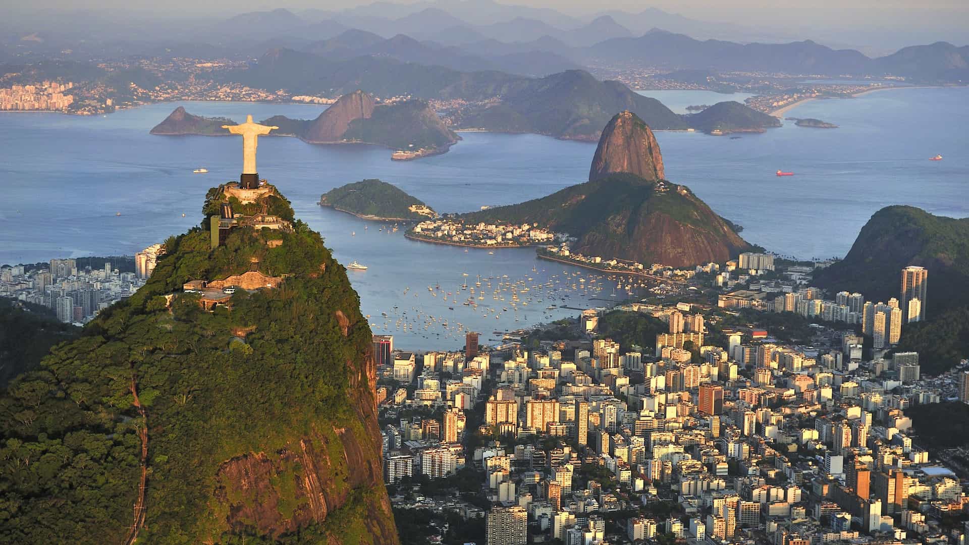 Rio de Janeiro panorama with Christ the Redeemer and Sugarloaf Mountain, inspiring South America global travel for Avalon Waterways enthusiasts.