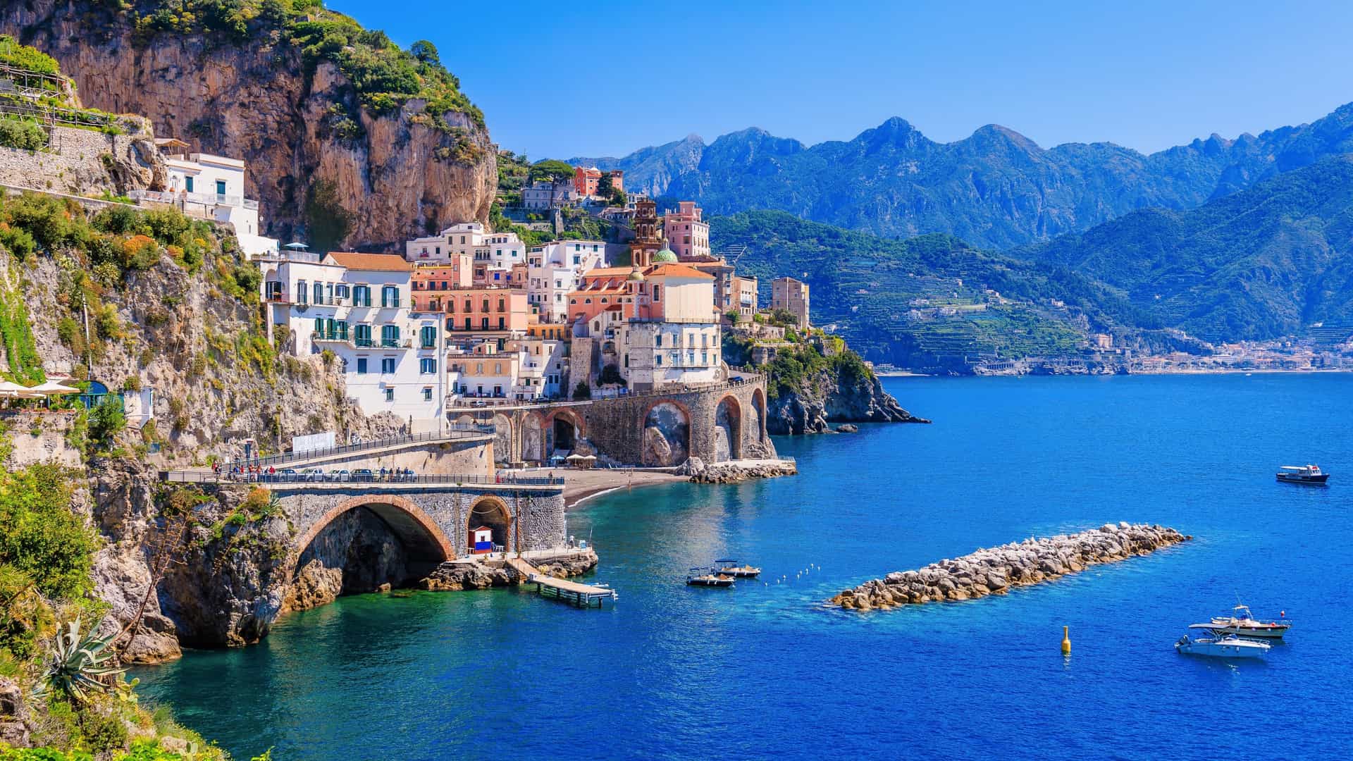 Azamara Cruises: Amalfi, Italy - beautiful coastal town, cliffs, Mediterranean Sea, picturesque European cruise port.
