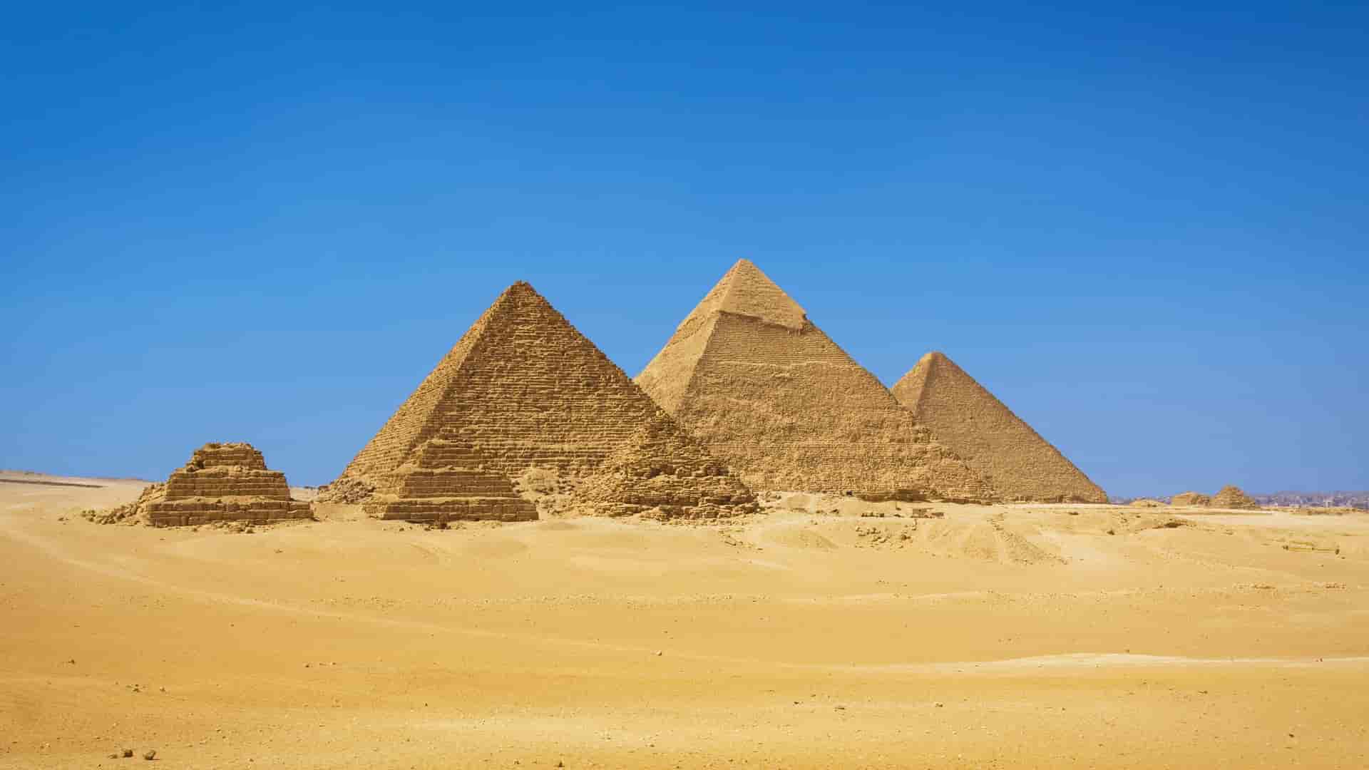 Great Pyramids of Giza in desert.