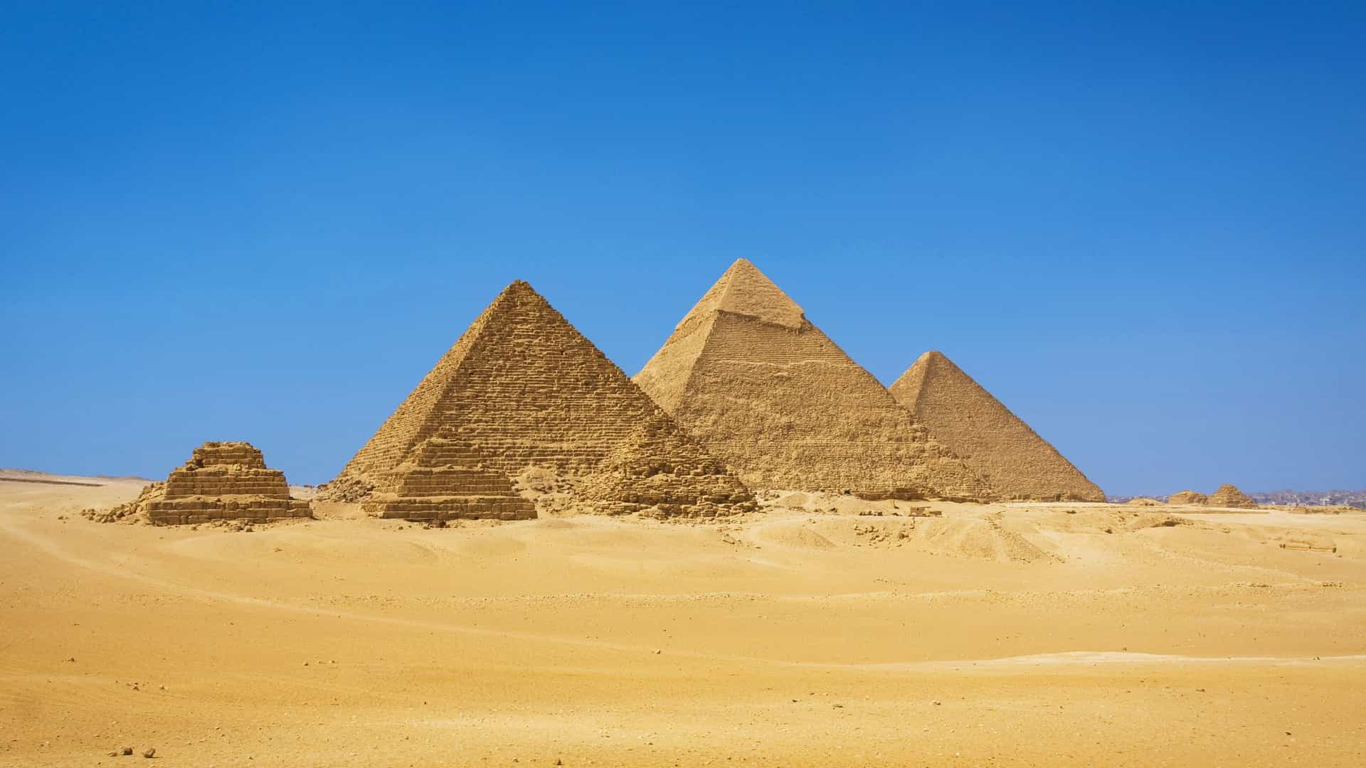 Great Pyramids of Giza in desert.