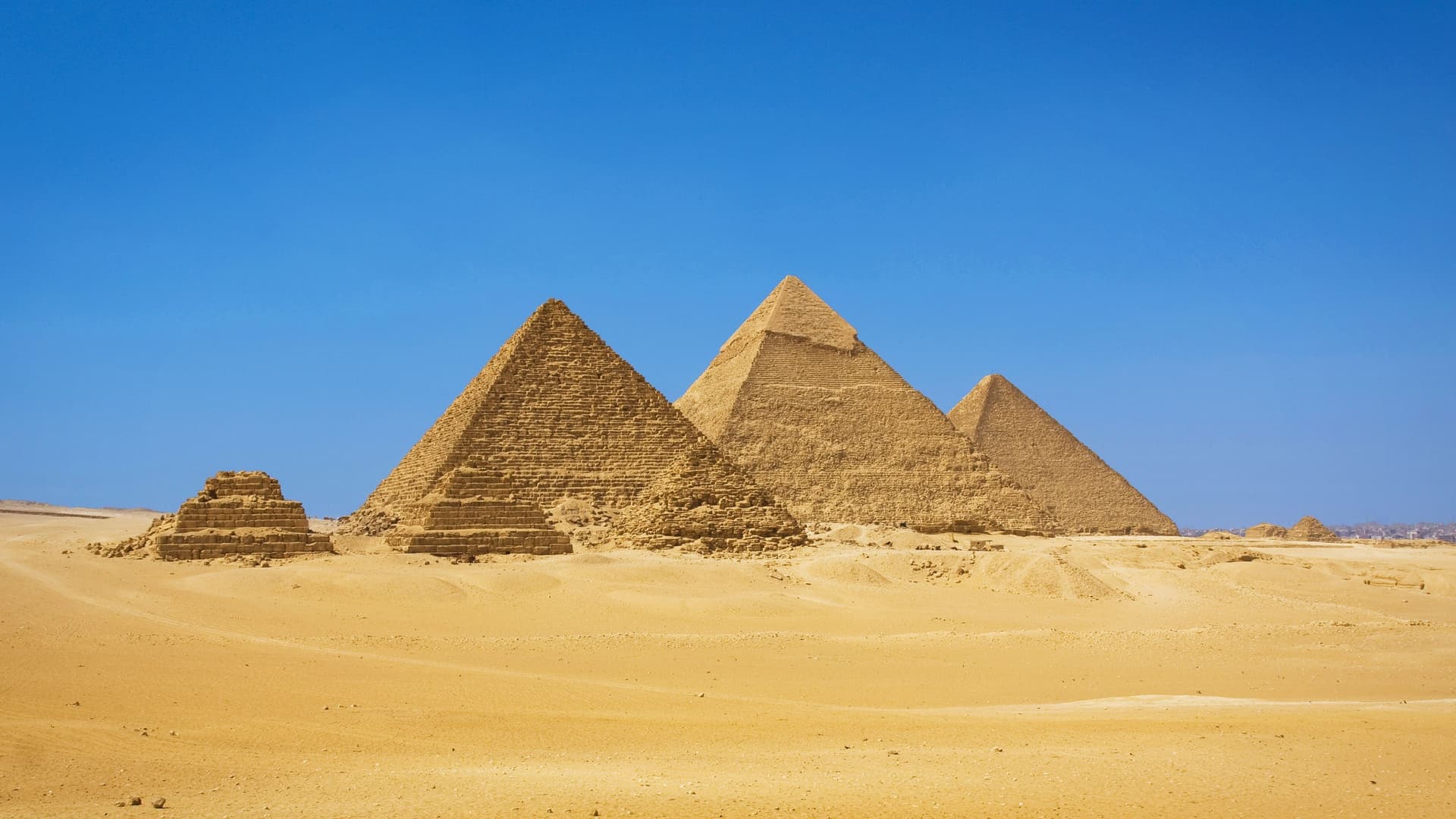 Great Pyramids of Giza in desert.