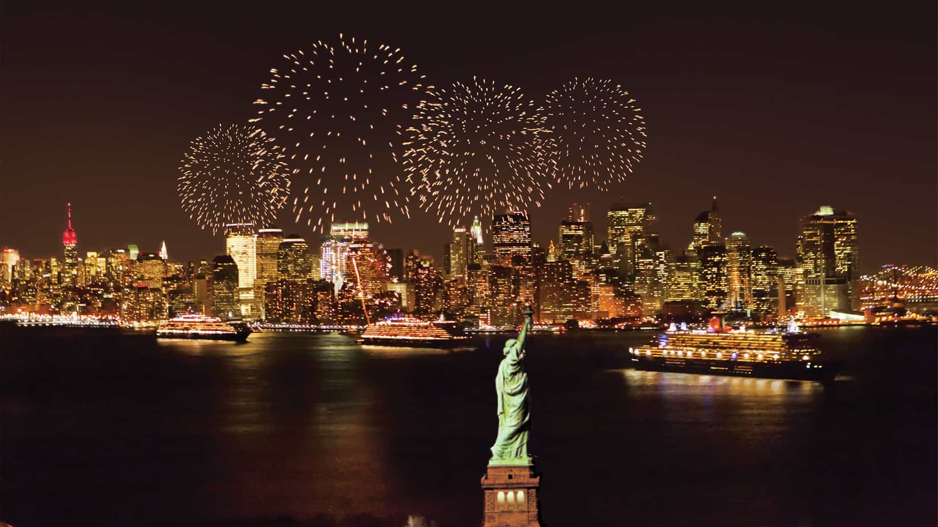 The Statue of Liberty in the foreground, with the dazzling New York City skyline illuminated by fireworks and a Cunard cruise ship, capturing the grand celebration of a World Cruise.
