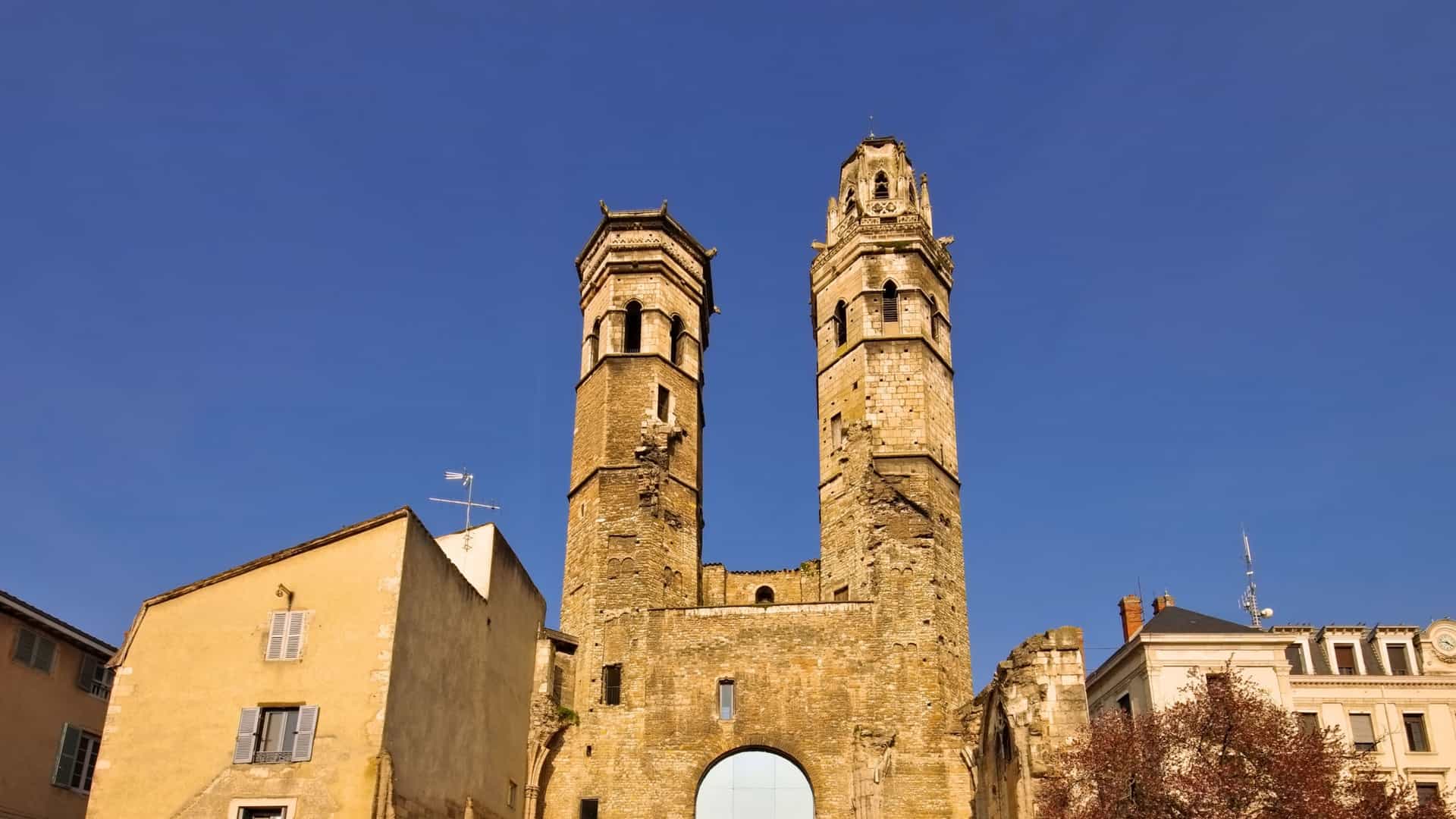 The two remaining Romanesque towers and narthex of the old Saint Vincent Cathedral, also known as Vieux Saint Vincent, in Mâcon, France.
