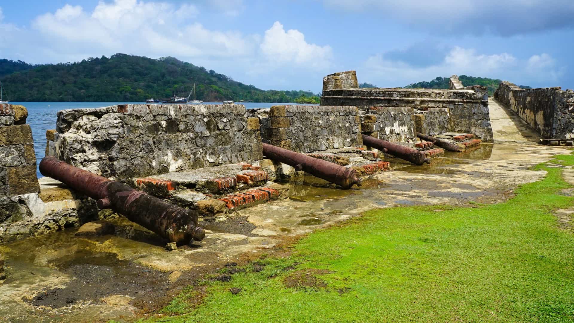 The historic fortifications along the Caribbean coast of Portobelo, Panama, showing the stone ruins of the Spanish colonial defenses that protected the port.