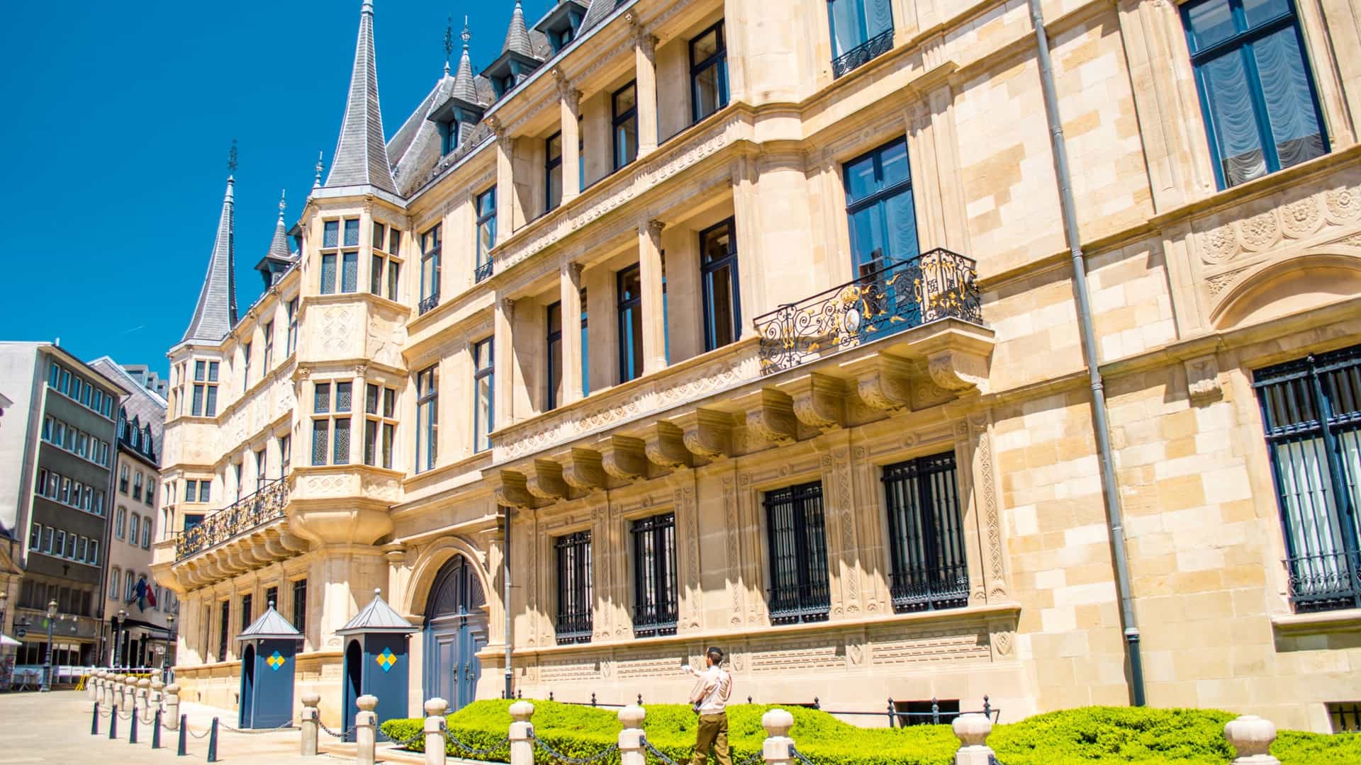 The Grand Ducal Palace in Luxembourg City, the official residence of the Grand Duke. The palace has a beautiful Flemish Renaissance style façade with ornate details and pointed turrets. Soldiers from the military of Luxembourg are often seen performing guard duties in front of the building.