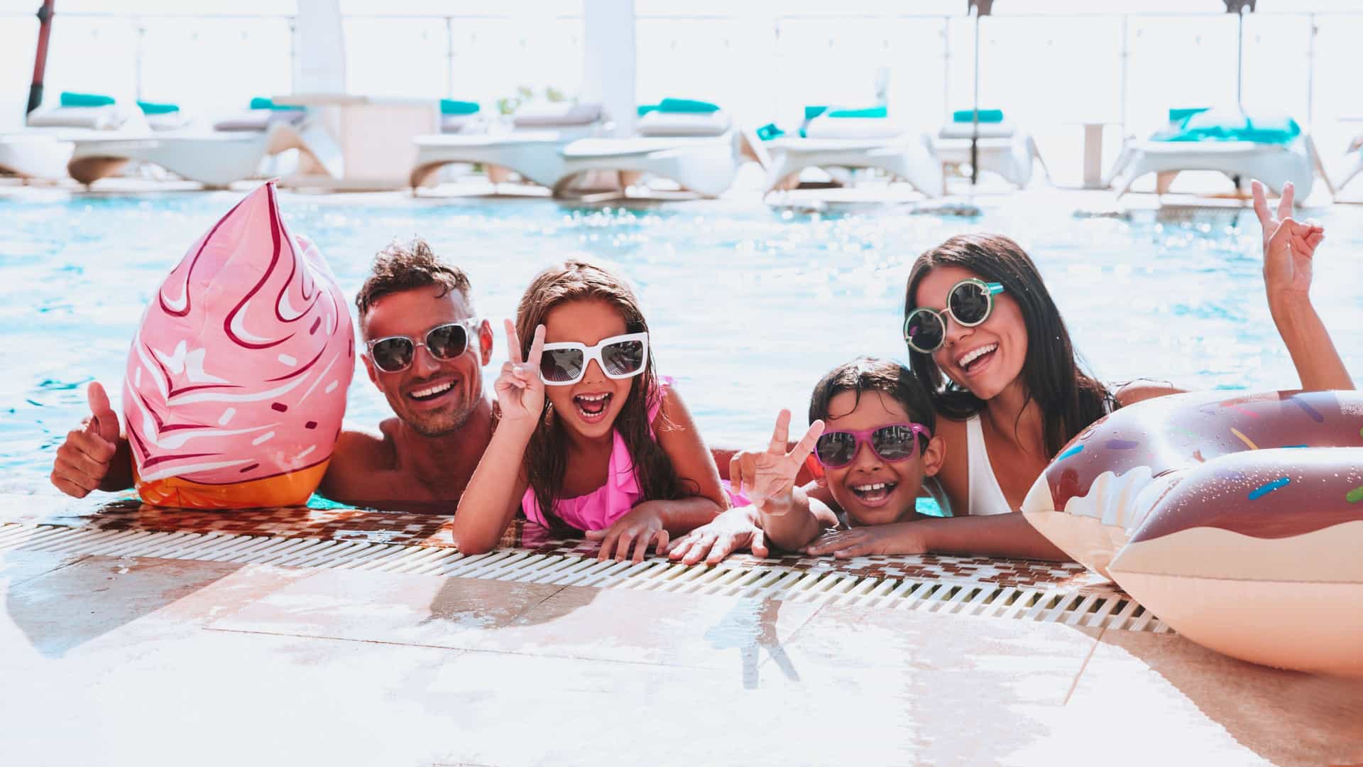 A family enjoying a pool time on a cruise vacation.
