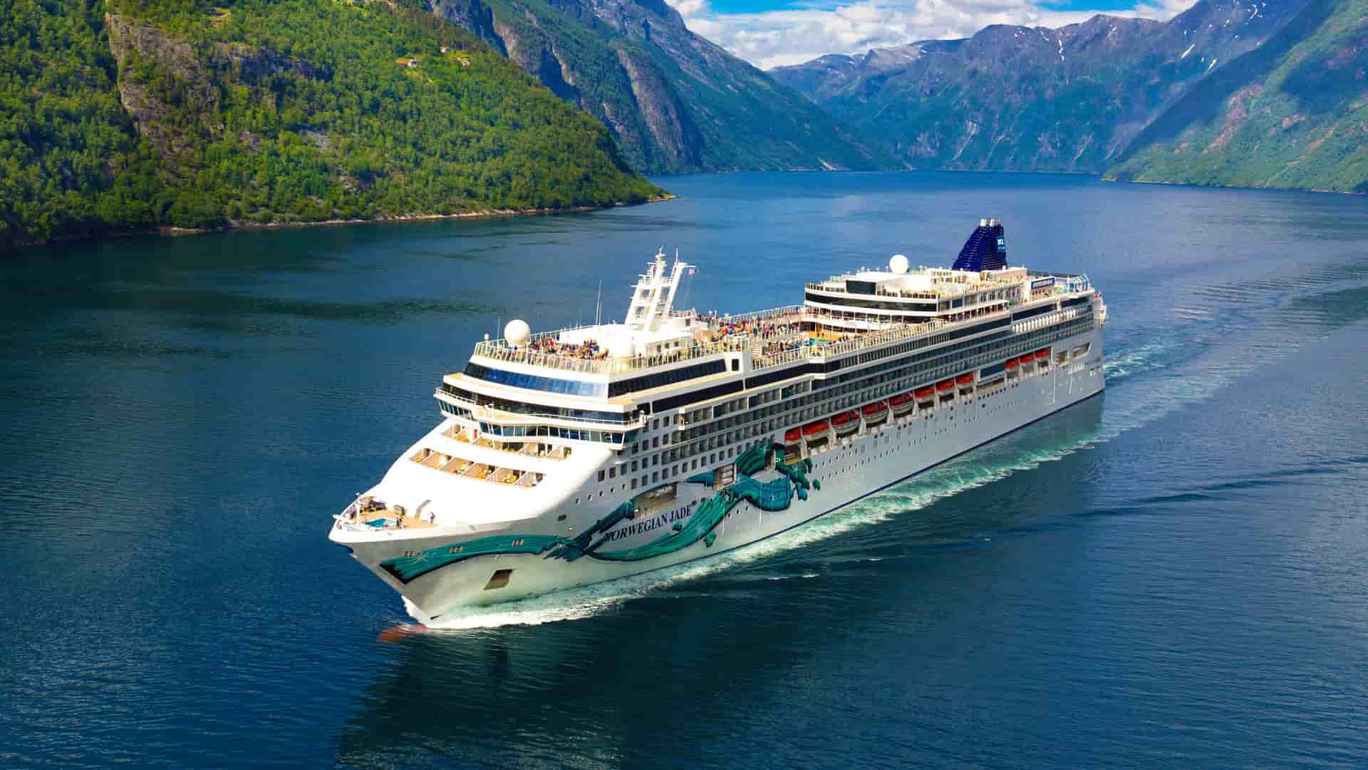 Norwegian Jade sailing in a fjord.