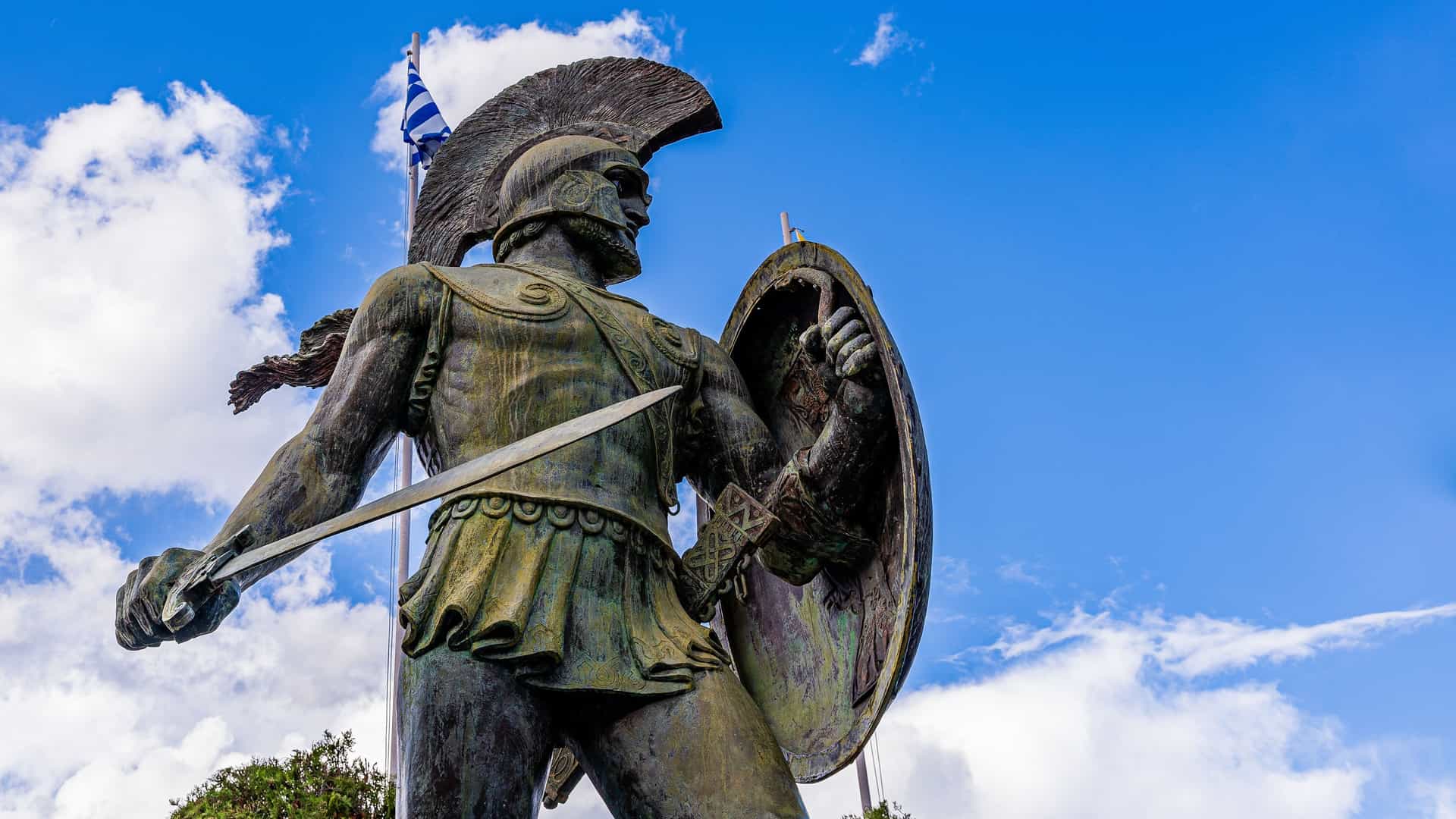 "A striking statue of the Spartan King Leonidas holding a sword and shield, a tribute to the ancient warrior, in the city of Sparta, Greece. "