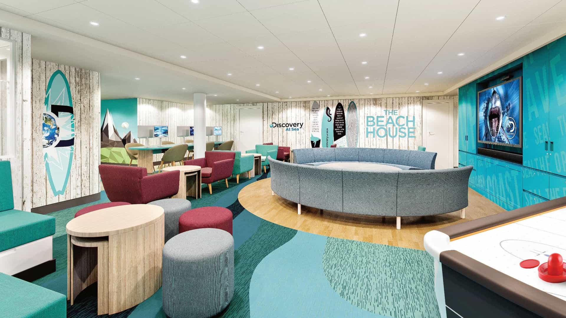 The Beach House teen lounge on a Princess Cruises ship, featuring a surf-themed indoor hang-out space with a large circular couch, flat-screen TV, air hockey table, and Discovery at Sea branding.