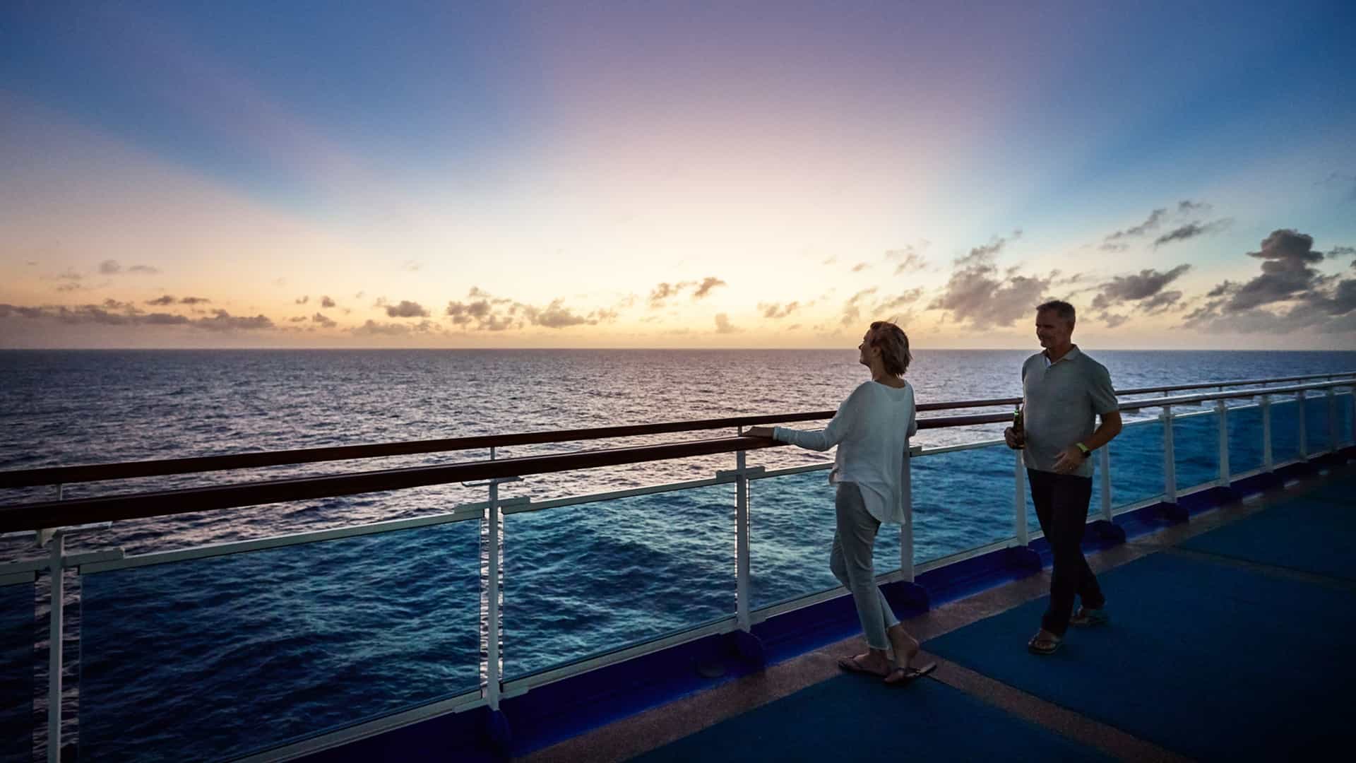 Passengers enjoy a breathtaking sunset view from the deck of a Princess Cruises ship during a Transatlantic crossing.