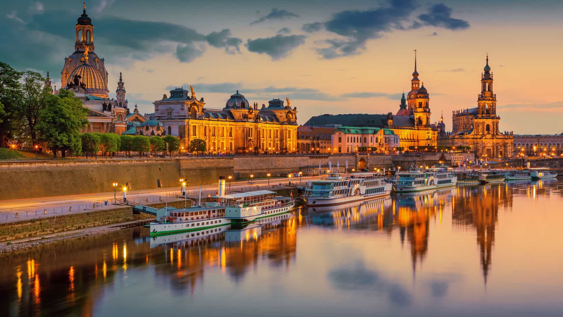 View of Dresden city skyline from Elbe river next to Augustus bridge in Germany.