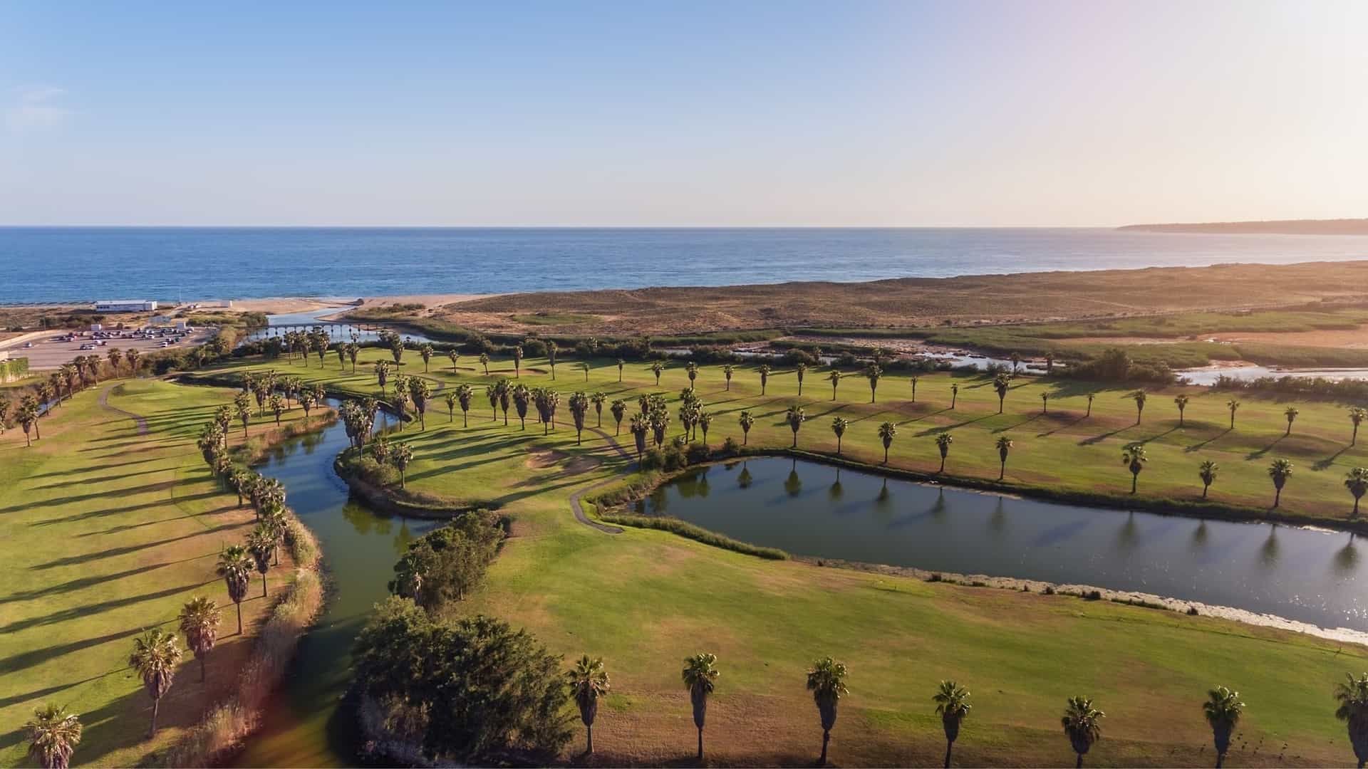 An aerial view of a golf course at Salhados Beach in Portugal.