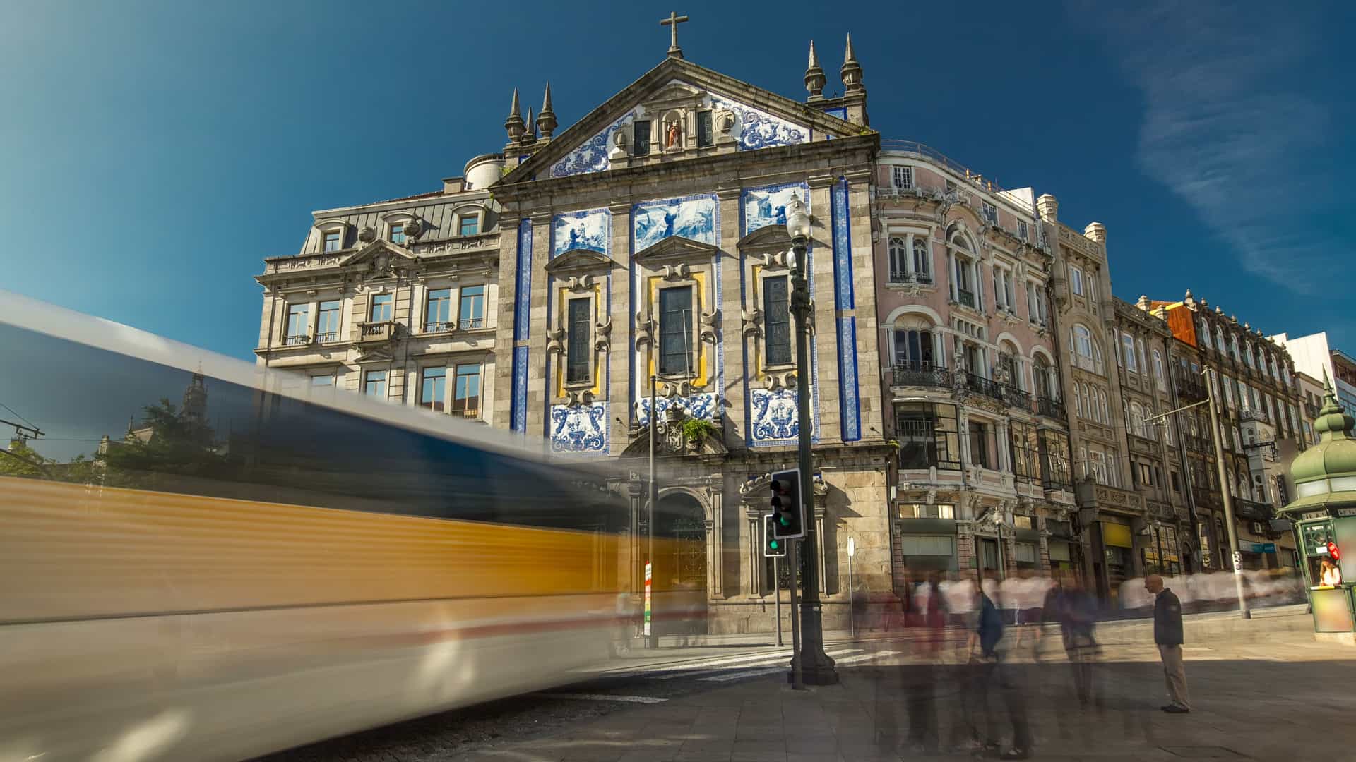 Almeida Garret Square near the Sao Bento railway station with Congregados Church facade at the front timelapse hyperlapse, Porto, Portugal.
