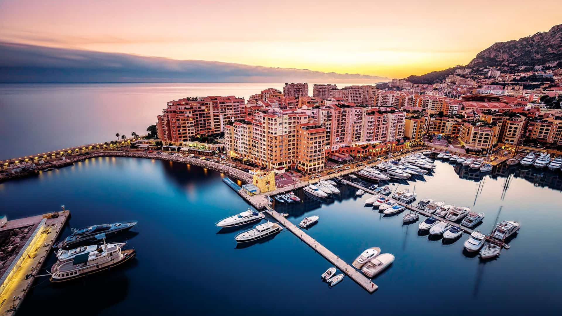 An aerial view of the luxurious marina in Monte Carlo, Monaco, a glamorous destination in the Mediterranean and a highlight of a luxury Seabourn cruise itinerary.