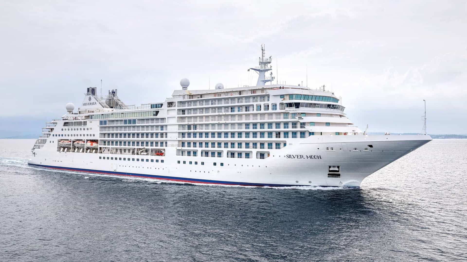 Tauck cruise featuring Silversea Silver Moon luxury cruise ship sailing at sea
