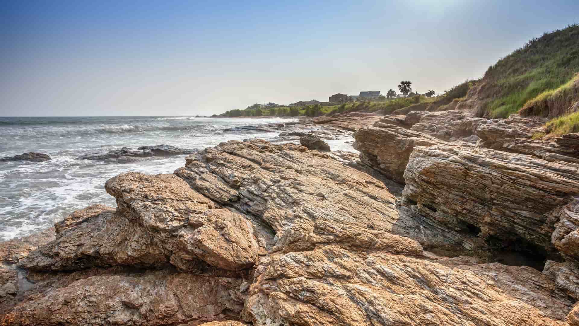 Rocky coastline near Tema and Accra, Ghana.