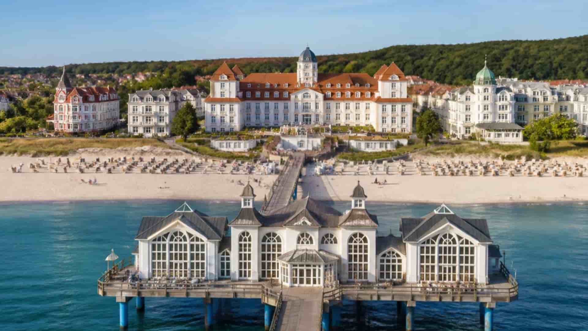 The elegant Baltic seaside resort of Binz, Germany, with its historic pier, white sandy beach and resort architecture.